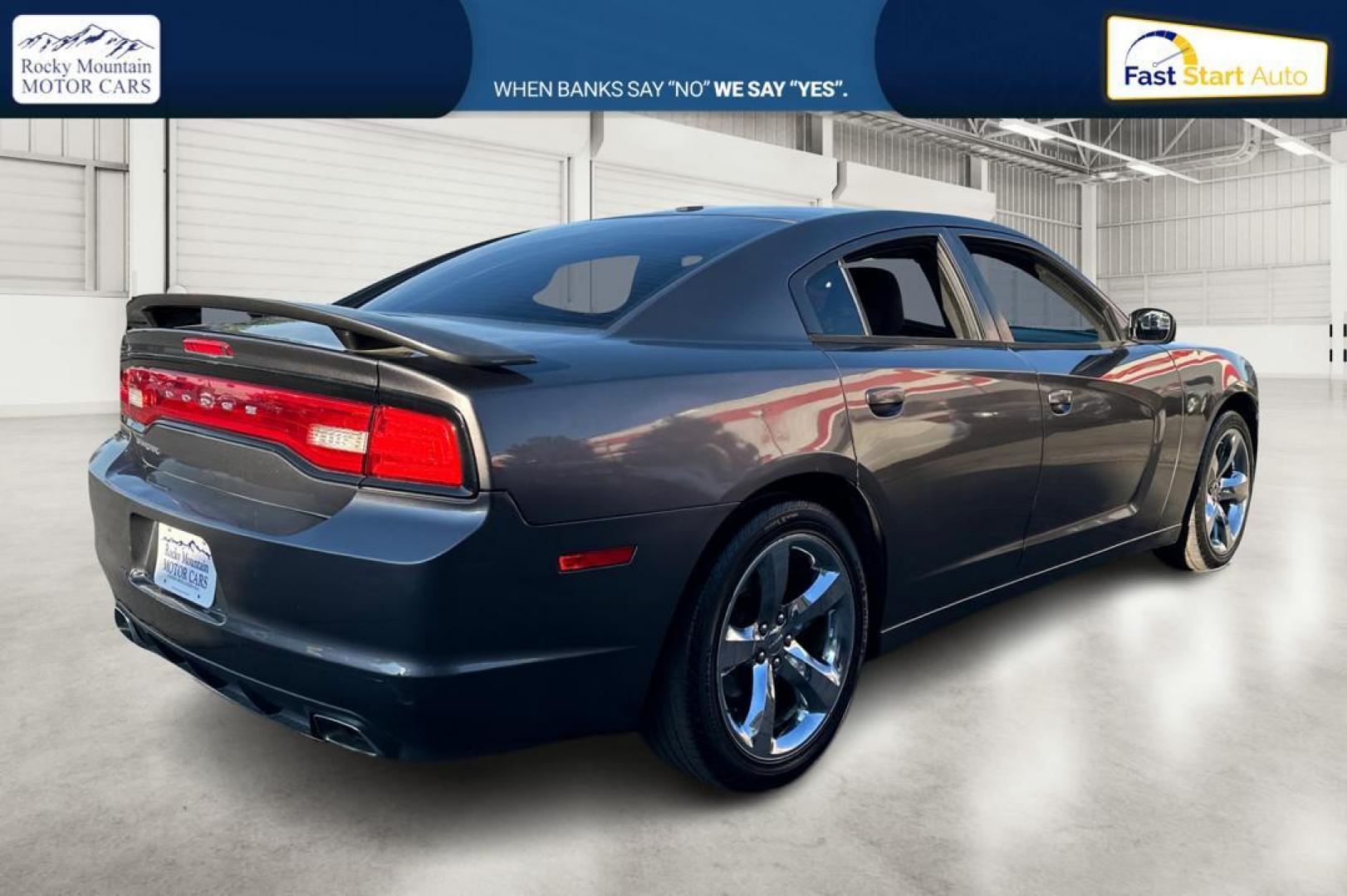 2014 Gray Dodge Charger SE (2C3CDXBG4EH) with an 3.6L V6 DOHC 24V engine, 5-Speed Automatic transmission, located at 767 S State Road, Pleasant Grove, UT, 84062, (801) 785-1058, 40.354839, -111.736687 - Photo#2