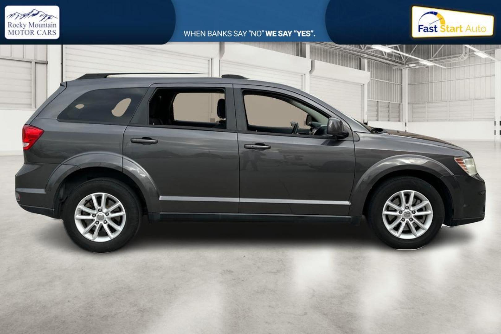 2014 Gray Dodge Journey SXT (3C4PDCBB6ET) with an 2.4L L6 DOHC 16V engine, 4-Speed Automatic transmission, located at 344 S Washington Blvd, Ogden, UT, 84404, (801) 399-1799, 41.255482, -111.970848 - Photo#1