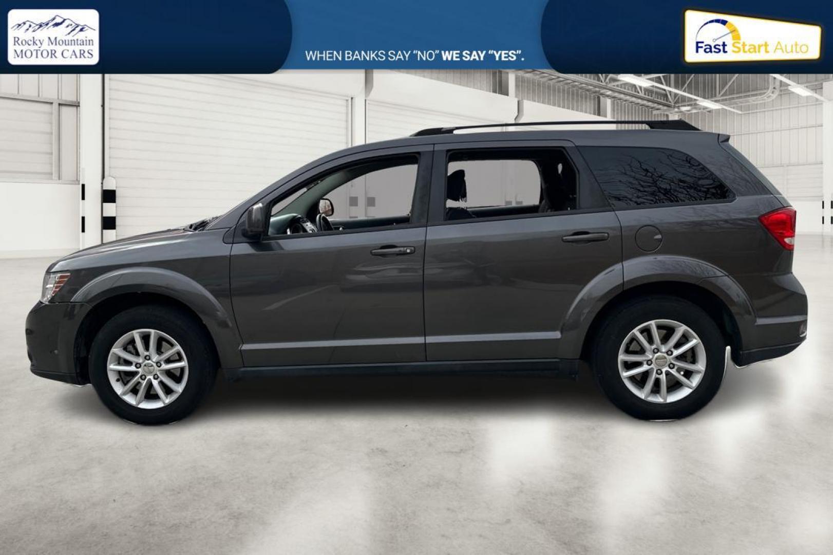 2014 Gray Dodge Journey SXT (3C4PDCBB6ET) with an 2.4L L6 DOHC 16V engine, 4-Speed Automatic transmission, located at 344 S Washington Blvd, Ogden, UT, 84404, (801) 399-1799, 41.255482, -111.970848 - Photo#6