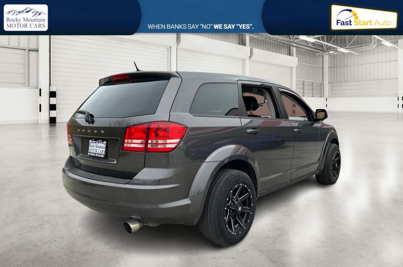 2014 Black Dodge Journey SE (3C4PDCAB5ET) with an 2.4L L4 DOHC 16V engine, 4-Speed Automatic transmission, located at 344 S Washington Blvd, Ogden, UT, 84404, (801) 399-1799, 41.255482, -111.970848 - Photo#2