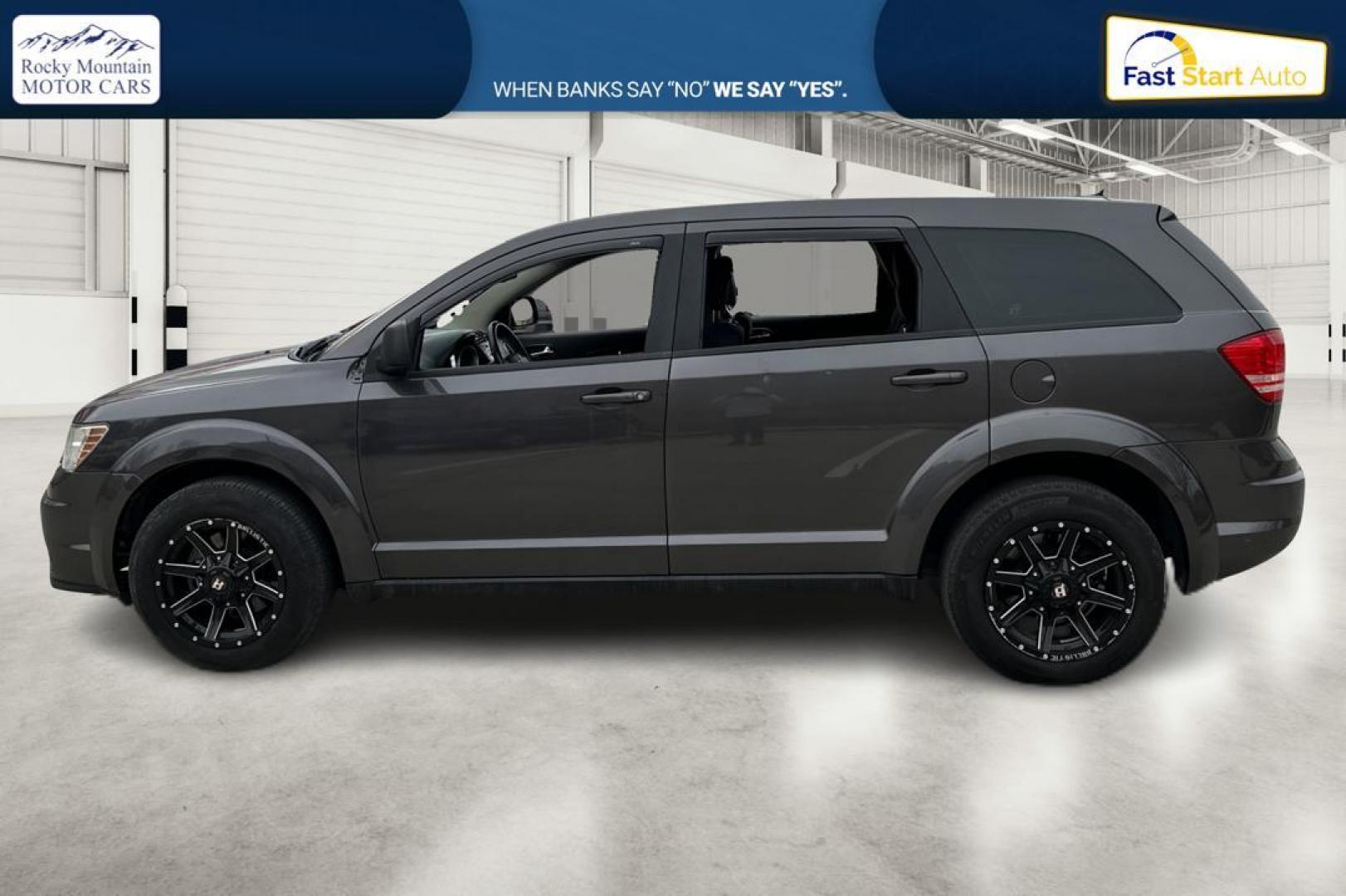 2014 Black Dodge Journey SE (3C4PDCAB5ET) with an 2.4L L4 DOHC 16V engine, 4-Speed Automatic transmission, located at 344 S Washington Blvd, Ogden, UT, 84404, (801) 399-1799, 41.255482, -111.970848 - Photo#6