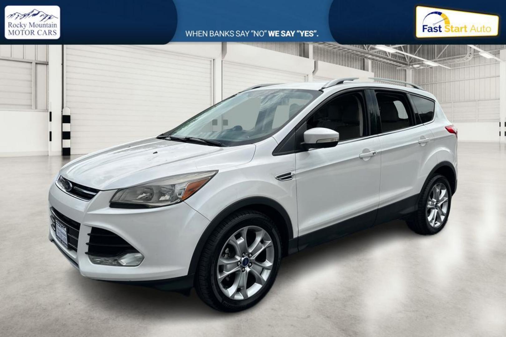 2014 White Ford Escape Titanium FWD (1FMCU0JX5EU) with an 1.6L L4 DOHC 16V engine, 6-Speed Automatic transmission, located at 767 S State Road, Pleasant Grove, UT, 84062, (801) 785-1058, 40.354839, -111.736687 - Photo#6