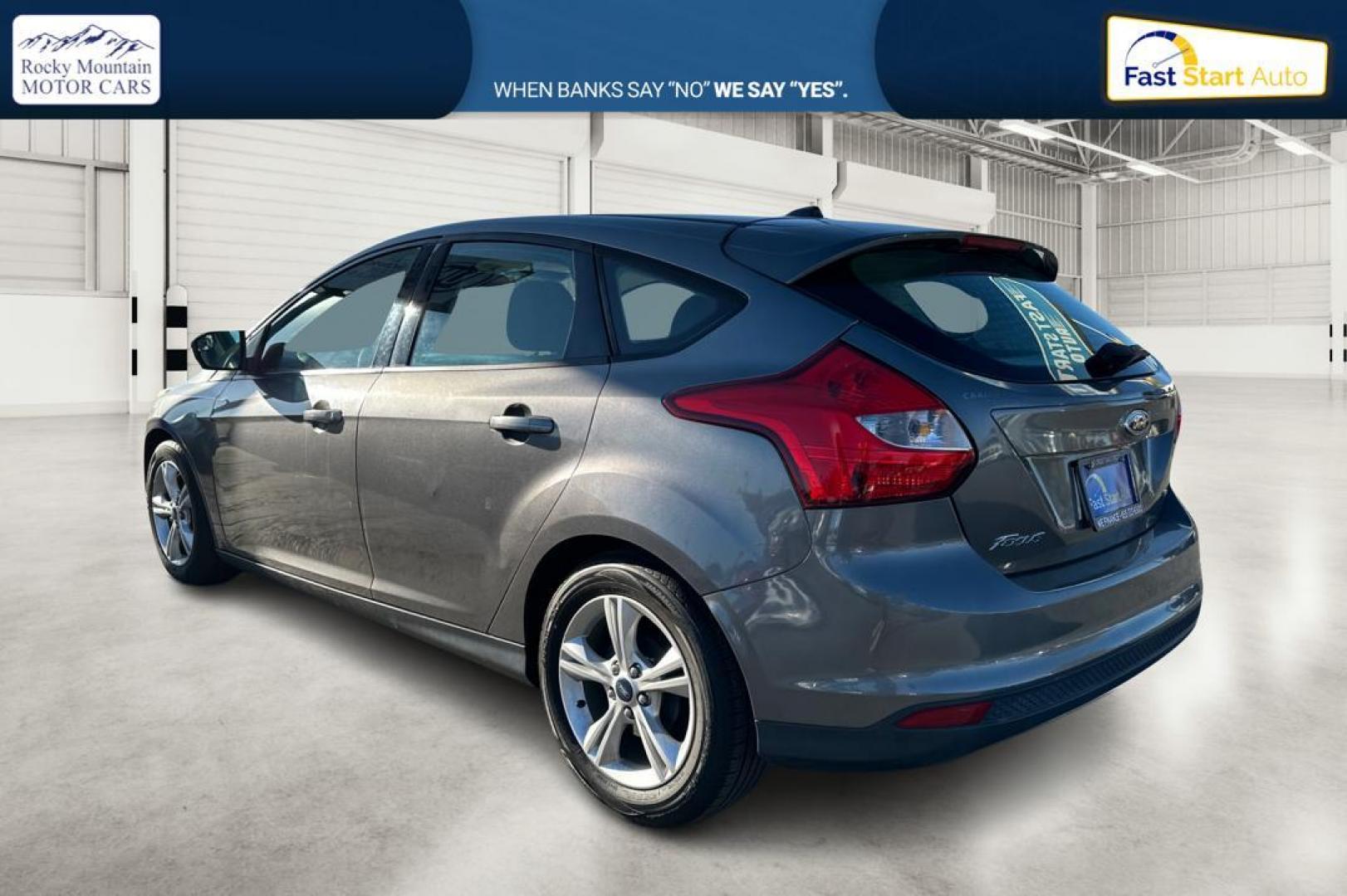 2014 Gray Ford Focus SE Hatch (1FADP3K23EL) with an 2.0L L4 DOHC 16V engine, Auto, 6-Spd Pwr/SelShift transmission, located at 7755 State Street, Midvale, UT, 84047, (801) 753-9063, 40.610329, -111.892159 - Photo#5