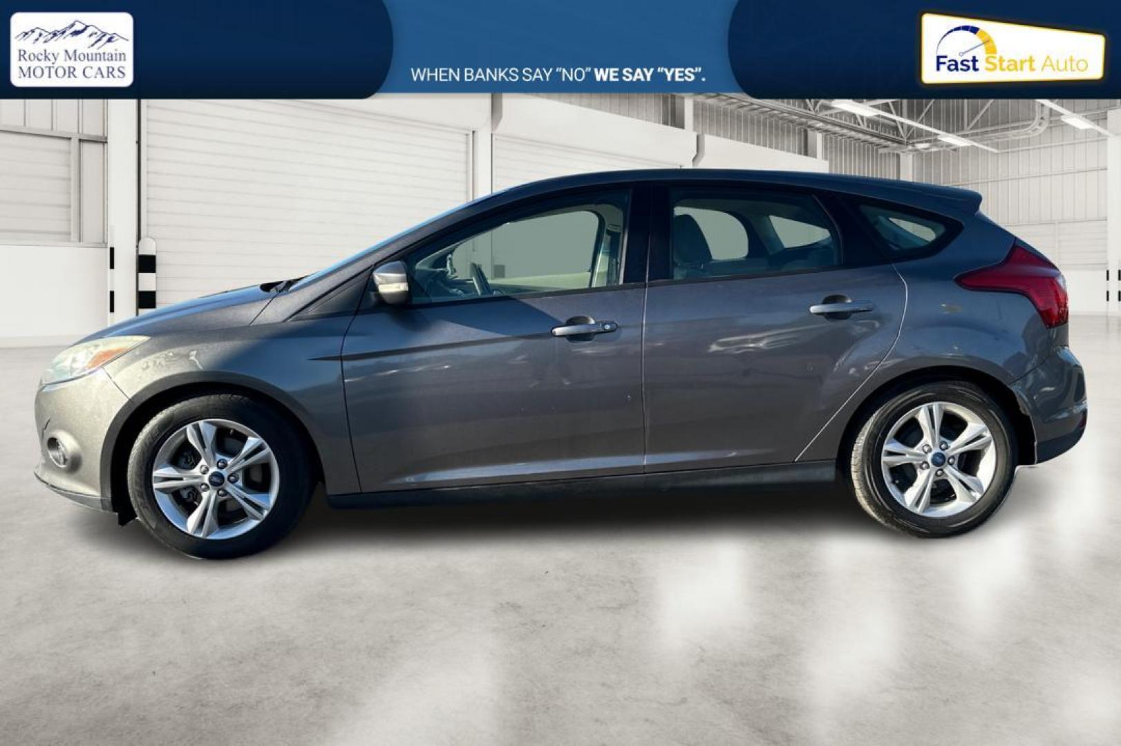 2014 Gray Ford Focus SE Hatch (1FADP3K23EL) with an 2.0L L4 DOHC 16V engine, Auto, 6-Spd Pwr/SelShift transmission, located at 7755 State Street, Midvale, UT, 84047, (801) 753-9063, 40.610329, -111.892159 - Photo#6