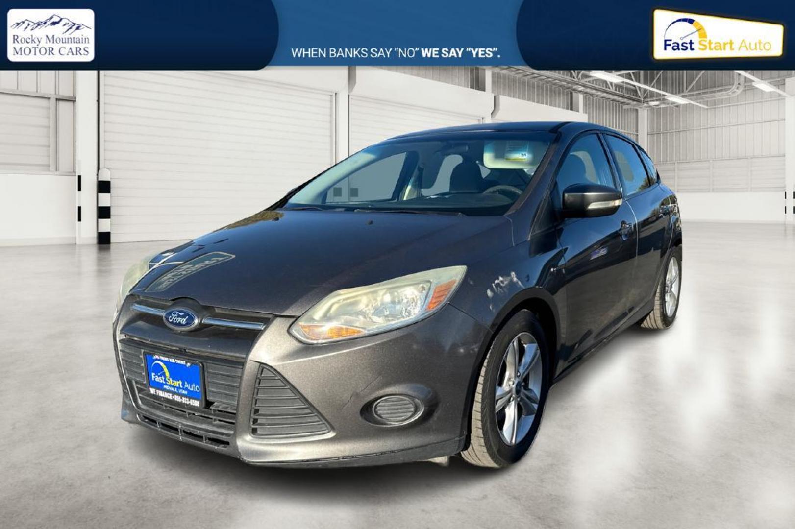 2014 Gray Ford Focus SE Hatch (1FADP3K23EL) with an 2.0L L4 DOHC 16V engine, Auto, 6-Spd Pwr/SelShift transmission, located at 7755 State Street, Midvale, UT, 84047, (801) 753-9063, 40.610329, -111.892159 - Photo#8