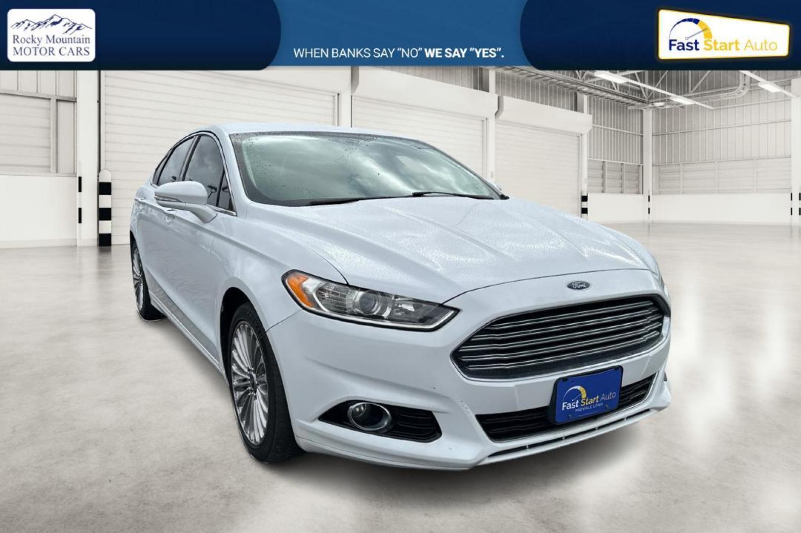 2014 White Ford Fusion Titanium (3FA6P0K93ER) with an 2.0L L4 DOHC 16V engine, Automatic, 6-Spd transmission, located at 7755 State Street, Midvale, UT, 84047, (801) 753-9063, 40.610329, -111.892159 - Photo#0