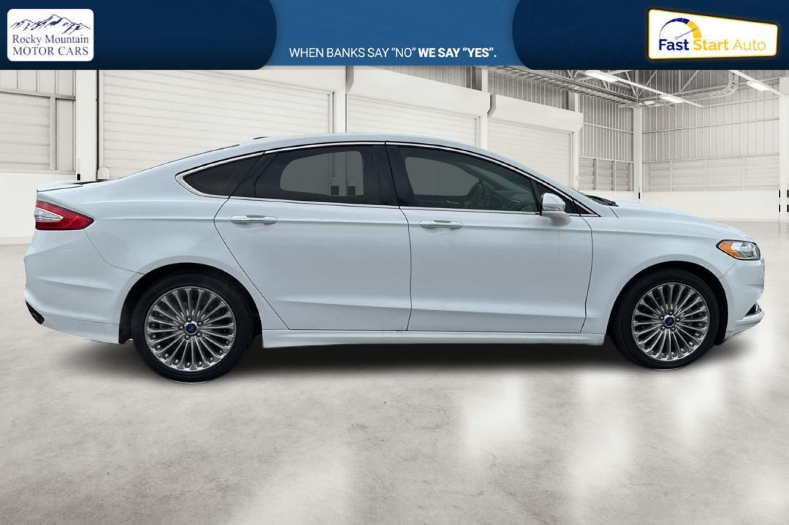 2014 White Ford Fusion Titanium (3FA6P0K93ER) with an 2.0L L4 DOHC 16V engine, Automatic, 6-Spd transmission, located at 7755 State Street, Midvale, UT, 84047, (801) 753-9063, 40.610329, -111.892159 - Photo#1