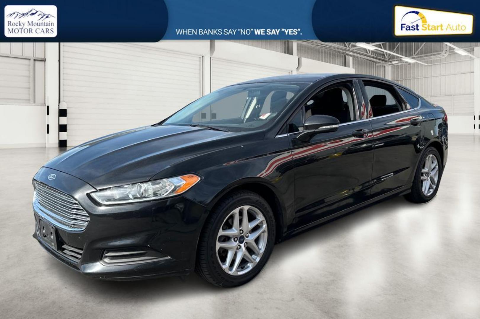 2014 Black Ford Fusion SE (3FA6P0HD1ER) with an 1.5L L4 DOHC 16V engine, Automatic, 6-Spd transmission, located at 767 S State Road, Pleasant Grove, UT, 84062, (801) 785-1058, 40.354839, -111.736687 - Photo#8