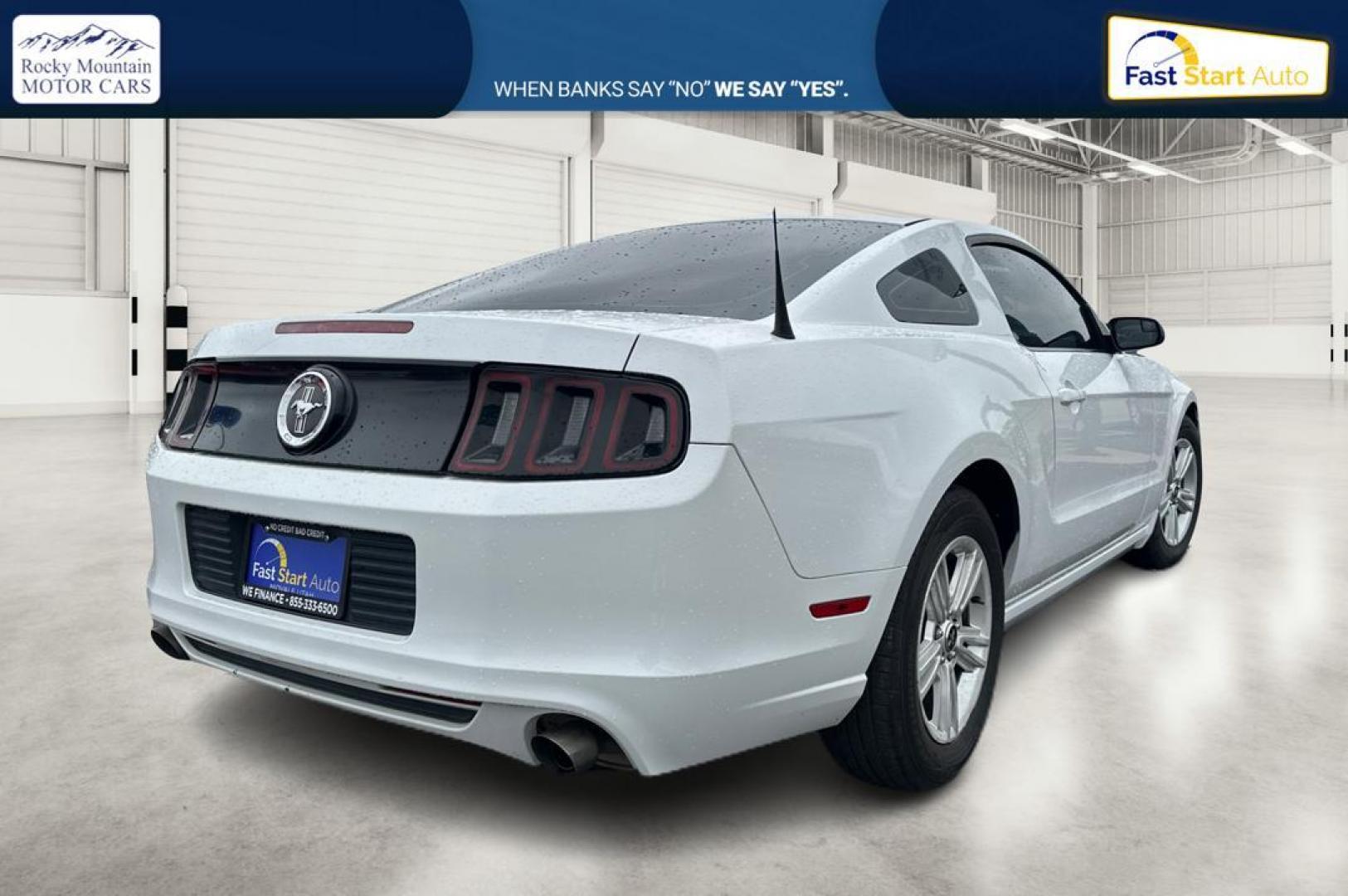 2014 White Ford Mustang V6 Coupe (1ZVBP8AM5E5) with an 3.7L V6 DOHC 24V engine, Auto, 6-Spd SelectShift transmission, located at 344 S Washington Blvd, Ogden, UT, 84404, (801) 399-1799, 41.255482, -111.970848 - Photo#2