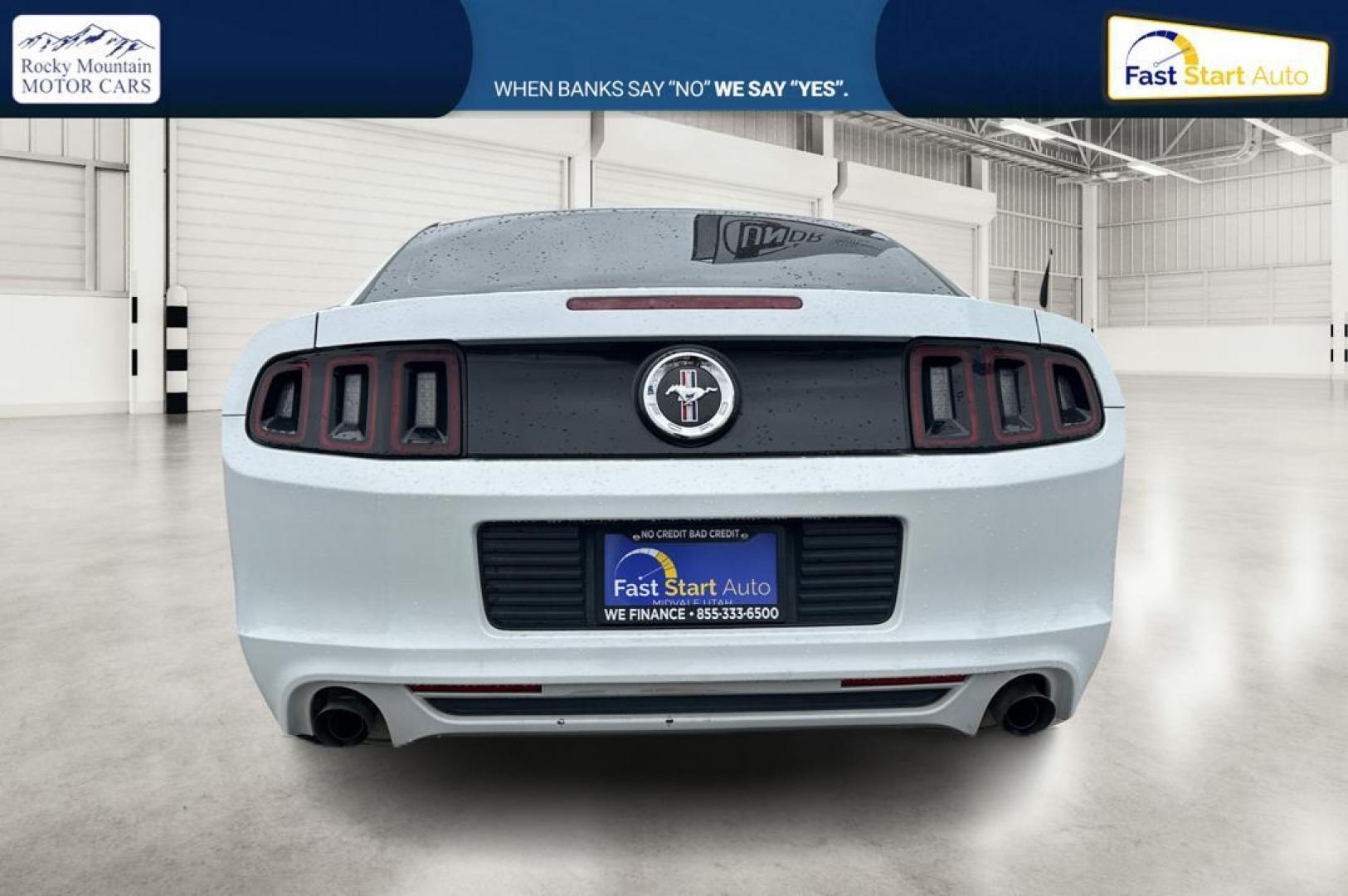 2014 White Ford Mustang V6 Coupe (1ZVBP8AM5E5) with an 3.7L V6 DOHC 24V engine, Auto, 6-Spd SelectShift transmission, located at 344 S Washington Blvd, Ogden, UT, 84404, (801) 399-1799, 41.255482, -111.970848 - Photo#4