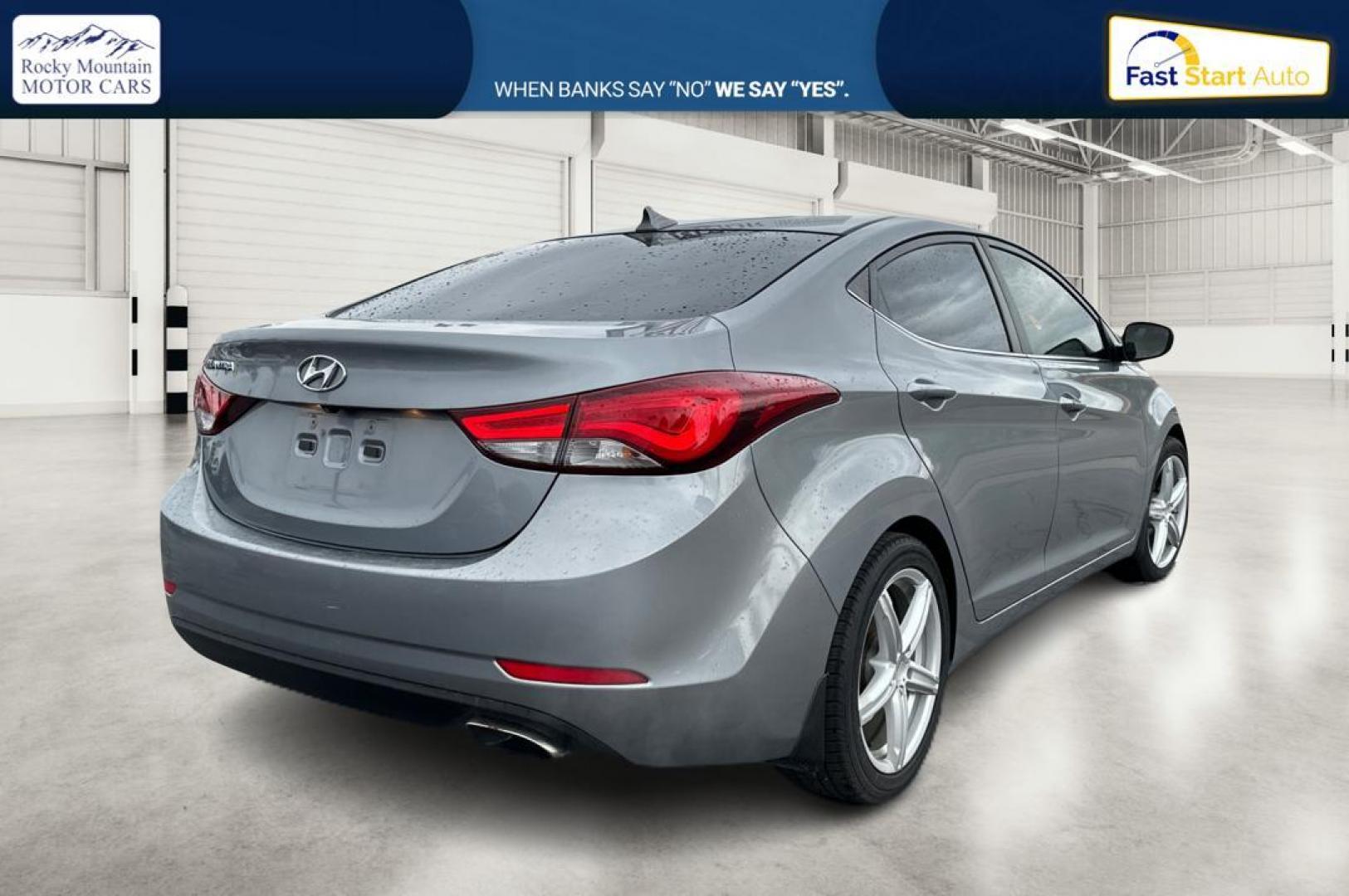 2014 Gray Hyundai Elantra GLS A/T (KMHDH4AH5EU) with an 2.0L L4 DOHC 16V engine, 6-Speed Automatic transmission, located at 344 S Washington Blvd, Ogden, UT, 84404, (801) 399-1799, 41.255482, -111.970848 - Photo#2