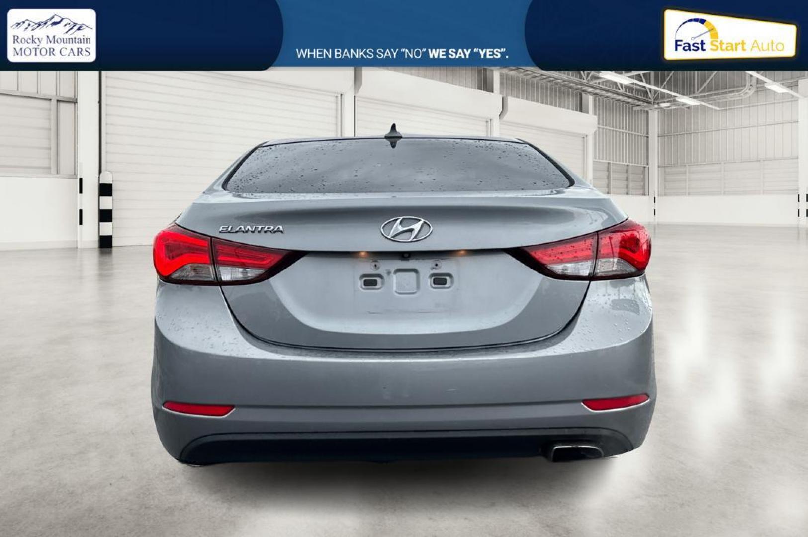 2014 Gray Hyundai Elantra GLS A/T (KMHDH4AH5EU) with an 2.0L L4 DOHC 16V engine, 6-Speed Automatic transmission, located at 344 S Washington Blvd, Ogden, UT, 84404, (801) 399-1799, 41.255482, -111.970848 - Photo#3