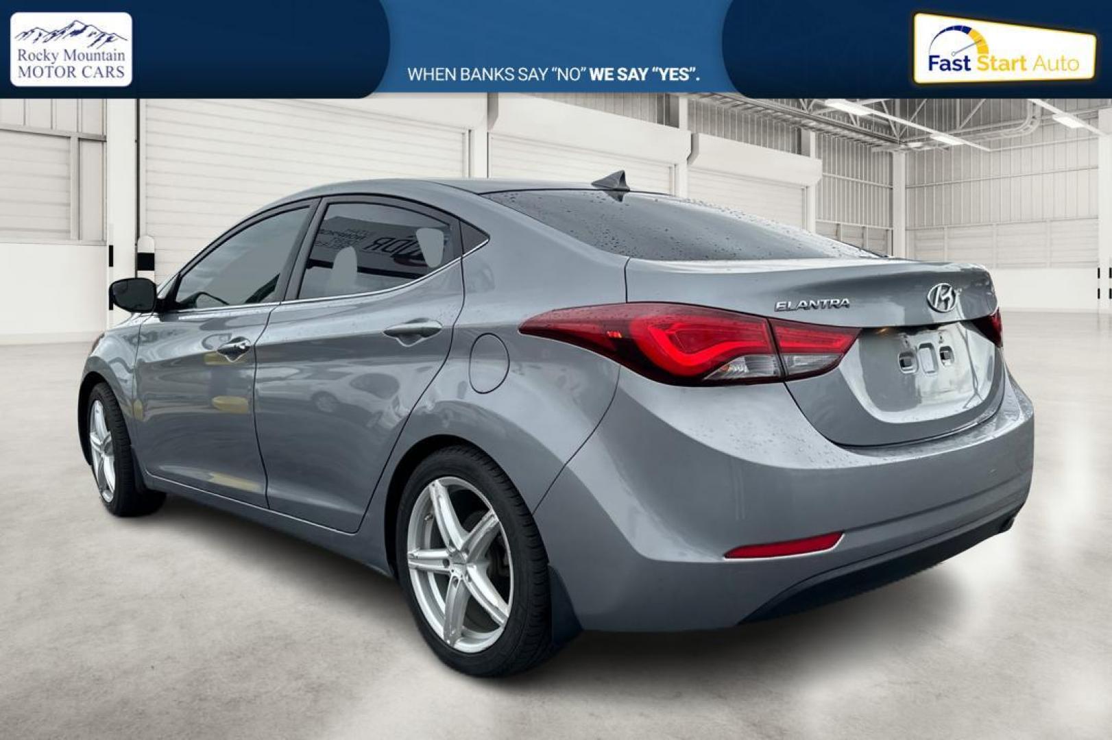 2014 Gray Hyundai Elantra GLS A/T (KMHDH4AH5EU) with an 2.0L L4 DOHC 16V engine, 6-Speed Automatic transmission, located at 767 S State Road, Pleasant Grove, UT, 84062, (801) 785-1058, 40.354839, -111.736687 - Photo#5