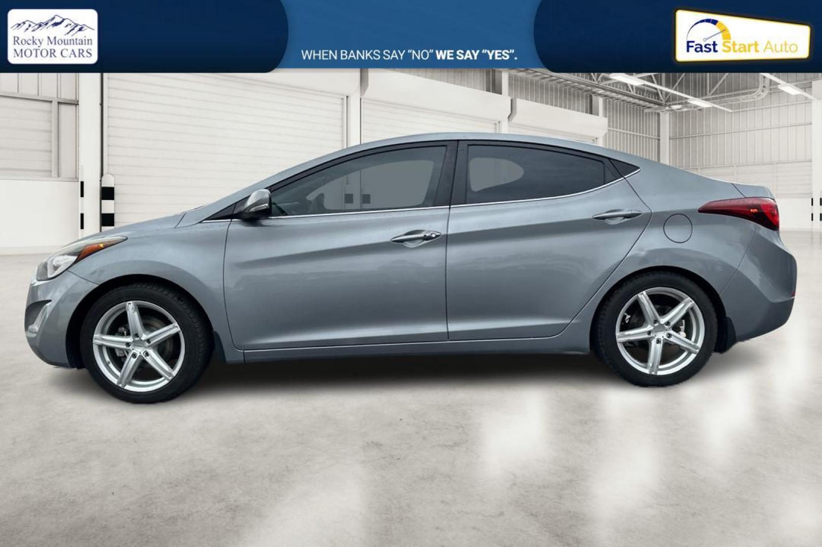 2014 Gray Hyundai Elantra GLS A/T (KMHDH4AH5EU) with an 2.0L L4 DOHC 16V engine, 6-Speed Automatic transmission, located at 344 S Washington Blvd, Ogden, UT, 84404, (801) 399-1799, 41.255482, -111.970848 - Photo#5