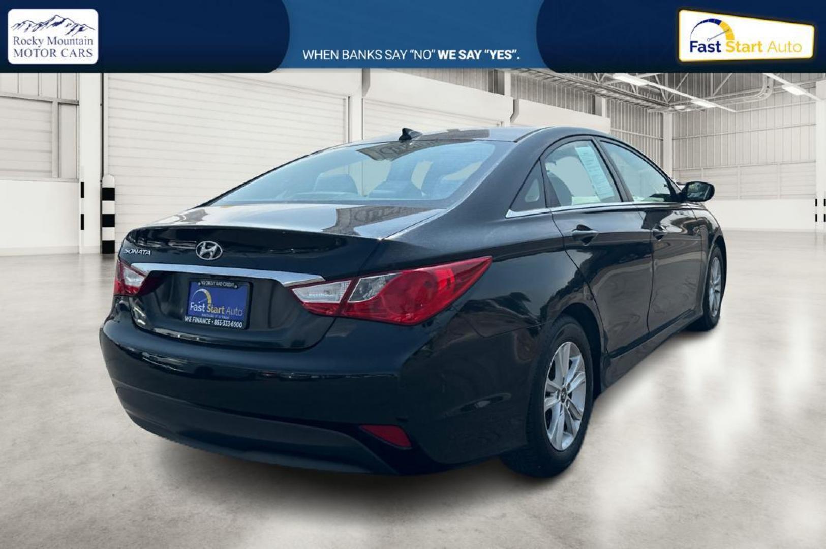 2014 Black Hyundai Sonata GLS (5NPEB4AC6EH) with an 2.4L L4 DOHC 16V engine, 6-Speed Automatic transmission, located at 344 S Washington Blvd, Ogden, UT, 84404, (801) 399-1799, 41.255482, -111.970848 - Photo#2