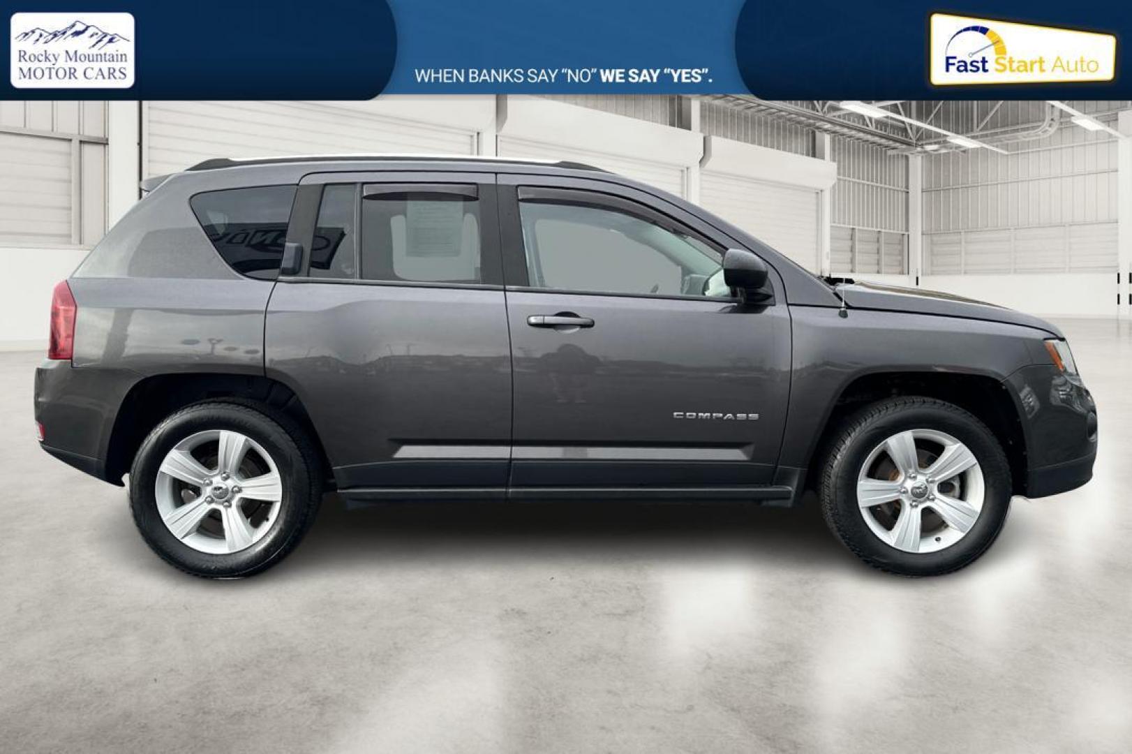 2014 Gray Jeep Compass Sport 4WD (1C4NJDBB3ED) with an 2.4L L4 DOHC 16V engine, Auto, 6-Spd AutoStick transmission, located at 7755 State Street, Midvale, UT, 84047, (801) 753-9063, 40.610329, -111.892159 - Photo#1