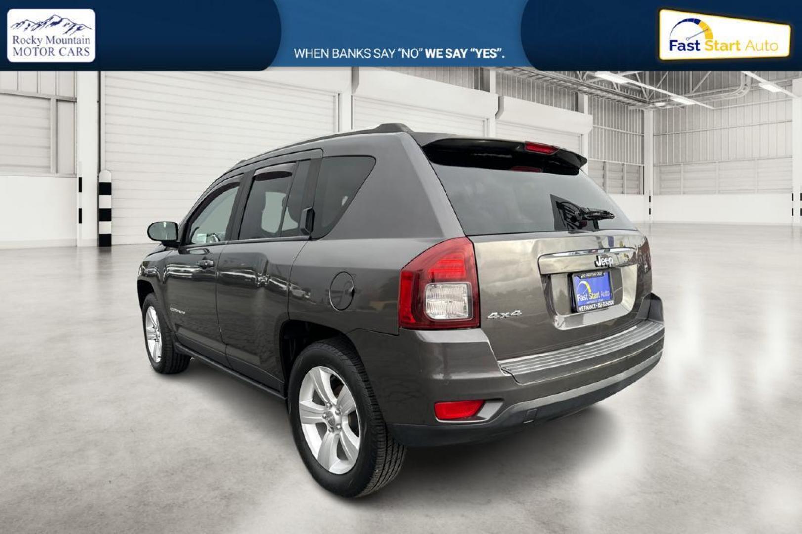 2014 Gray Jeep Compass Sport 4WD (1C4NJDBB3ED) with an 2.4L L4 DOHC 16V engine, Auto, 6-Spd AutoStick transmission, located at 7755 State Street, Midvale, UT, 84047, (801) 753-9063, 40.610329, -111.892159 - Photo#5