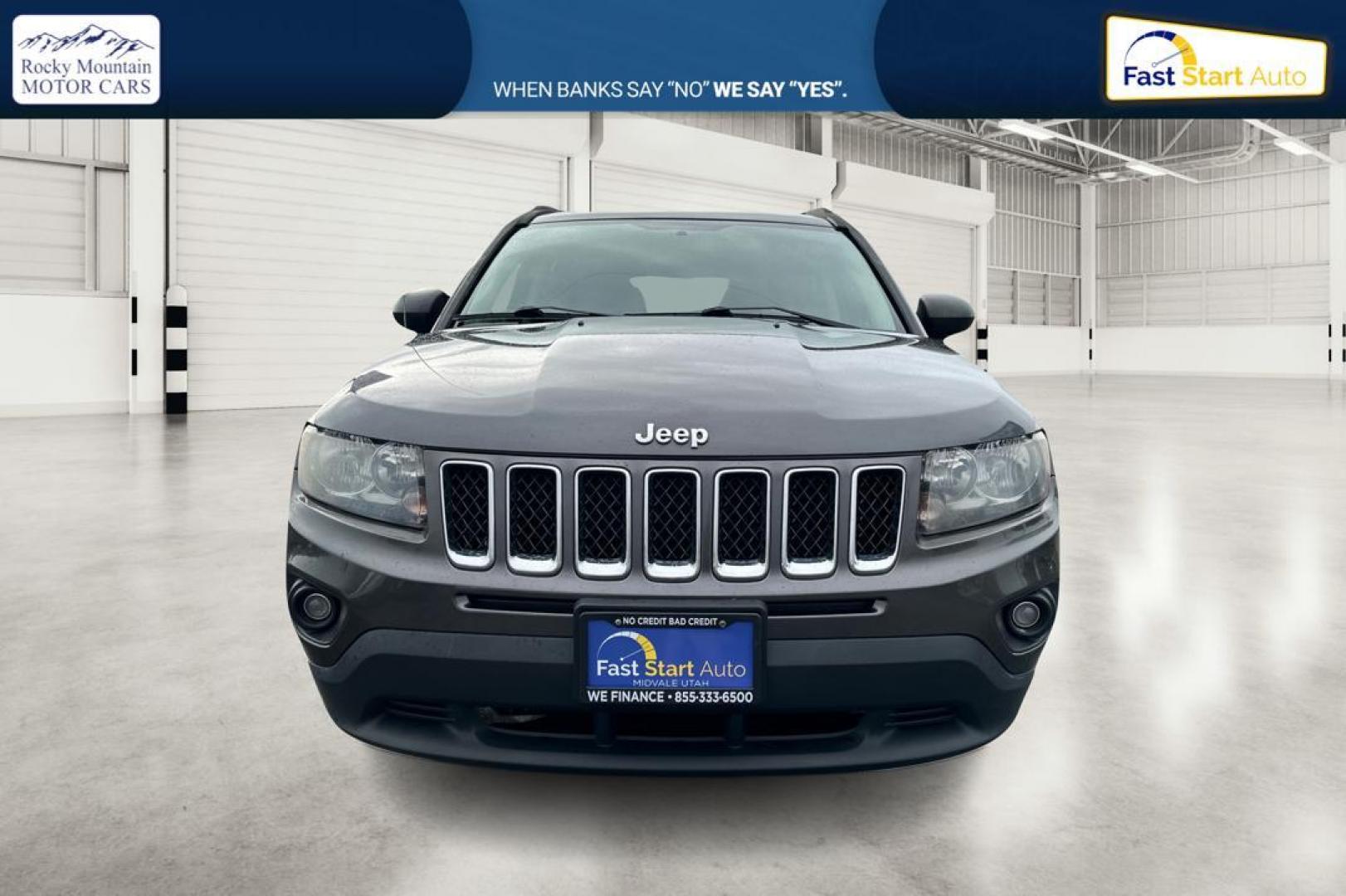 2014 Gray Jeep Compass Sport 4WD (1C4NJDBB3ED) with an 2.4L L4 DOHC 16V engine, Auto, 6-Spd AutoStick transmission, located at 7755 State Street, Midvale, UT, 84047, (801) 753-9063, 40.610329, -111.892159 - Photo#9