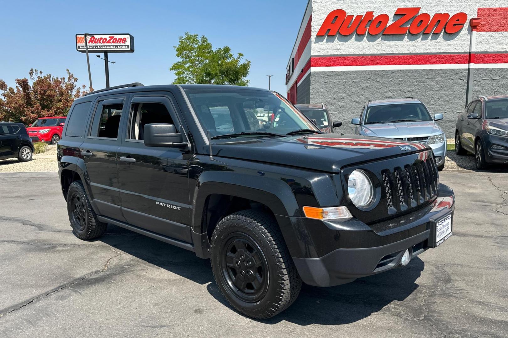 2014 Black Jeep Patriot Sport 2WD (1C4NJPBA2ED) with an 2.0L L4 DOHC 16V engine, Automatic, 6-Spd w/AutoStick transmission, located at 344 S Washington Blvd, Ogden, UT, 84404, (801) 399-1799, 41.255482, -111.970848 - Photo#0