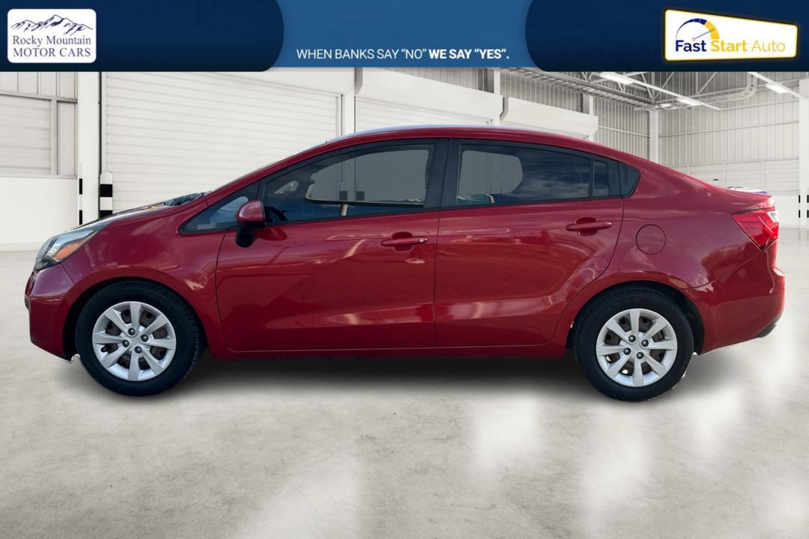 2014 Red Kia Rio LX (KNADM4A35E6) with an 1.6L L4 DOHC 16V engine, Automatic, 6-Spd transmission, located at 767 S State Road, Pleasant Grove, UT, 84062, (801) 785-1058, 40.354839, -111.736687 - Photo#6