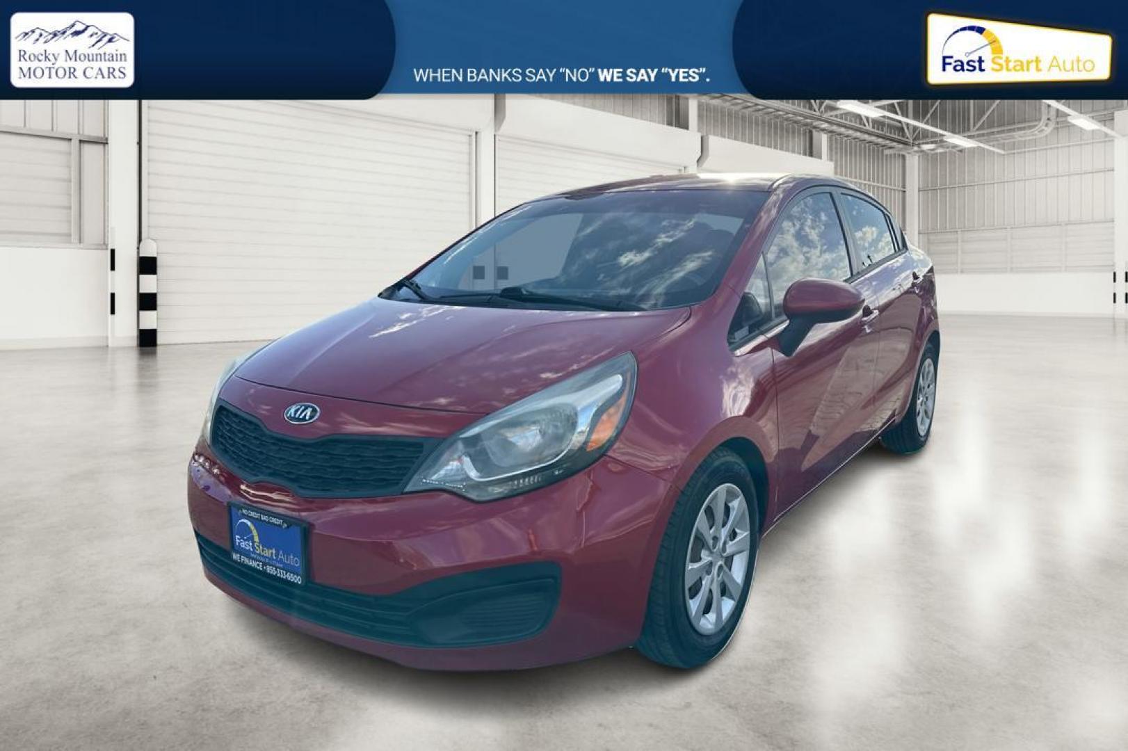 2014 Red Kia Rio LX (KNADM4A35E6) with an 1.6L L4 DOHC 16V engine, Automatic, 6-Spd transmission, located at 767 S State Road, Pleasant Grove, UT, 84062, (801) 785-1058, 40.354839, -111.736687 - Photo#8