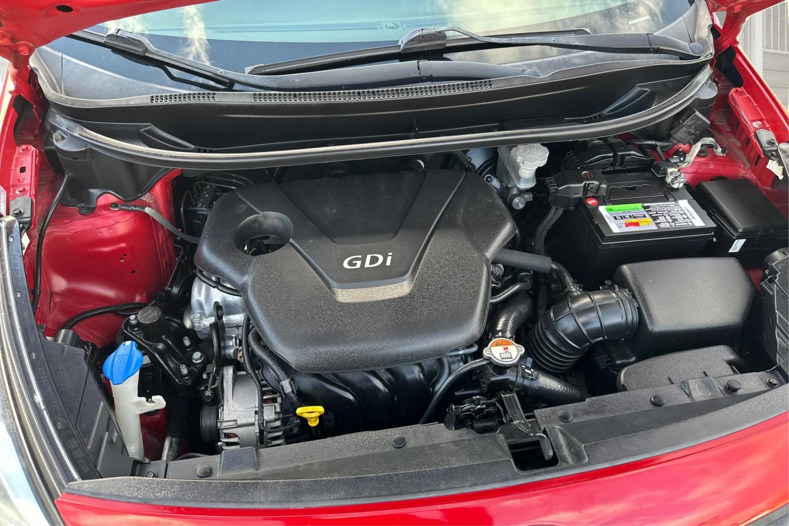 2014 Red Kia Rio LX (KNADM4A35E6) with an 1.6L L4 DOHC 16V engine, Automatic, 6-Spd transmission, located at 767 S State Road, Pleasant Grove, UT, 84062, (801) 785-1058, 40.354839, -111.736687 - Photo#10