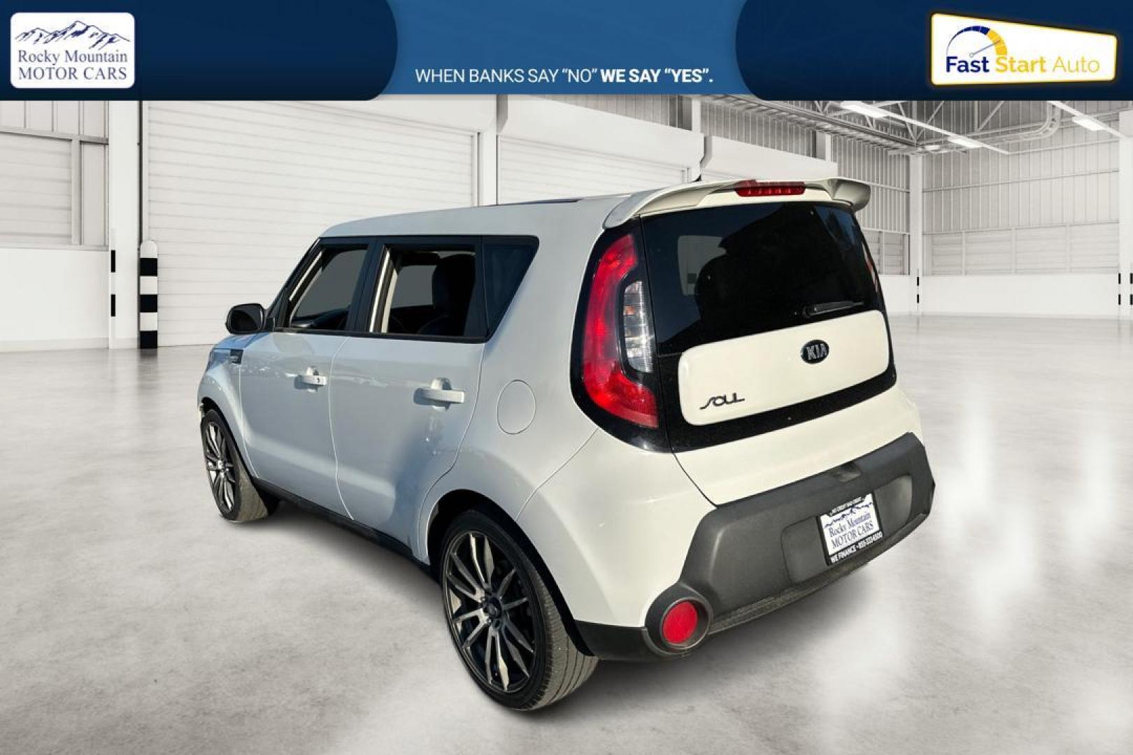 2014 White Kia Soul Base (KNDJN2A29E7) with an 1.6L L4 DOHC 16V engine, Automatic, 6-Spd transmission, located at 344 S Washington Blvd, Ogden, UT, 84404, (801) 399-1799, 41.255482, -111.970848 - Photo#4