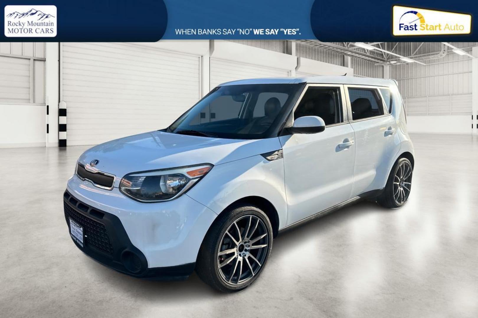 2014 White Kia Soul Base (KNDJN2A29E7) with an 1.6L L4 DOHC 16V engine, Automatic, 6-Spd transmission, located at 344 S Washington Blvd, Ogden, UT, 84404, (801) 399-1799, 41.255482, -111.970848 - Photo#6