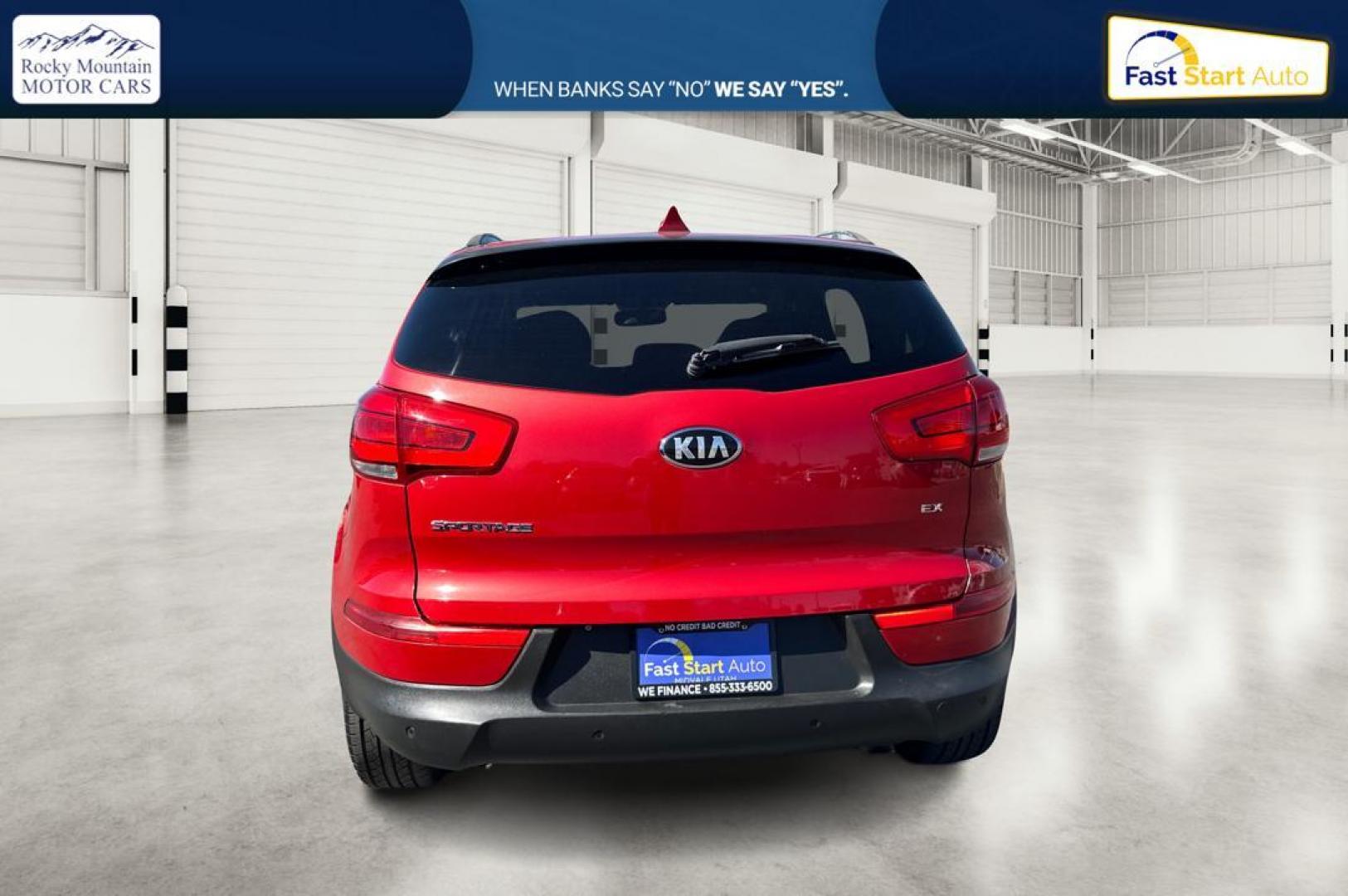 2014 Red Kia Sportage EX AWD (KNDPCCAC4E7) with an 2.4L V6 DOHC 24V engine, 6-Speed Automatic transmission, located at 7755 State Street, Midvale, UT, 84047, (801) 753-9063, 40.610329, -111.892159 - Photo#3