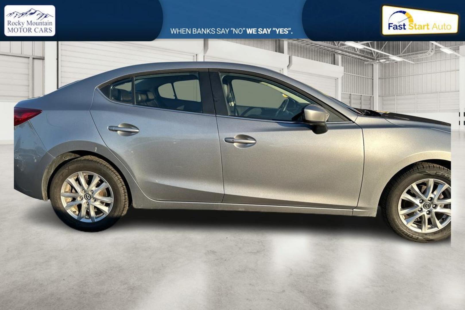 2014 Silver Mazda MAZDA3 i Grand Touring AT 4-Door (JM1BM1W76E1) with an 2.0L L4 DOHC 16V engine, 6-Speed Automatic transmission, located at 344 S Washington Blvd, Ogden, UT, 84404, (801) 399-1799, 41.255482, -111.970848 - Photo#1