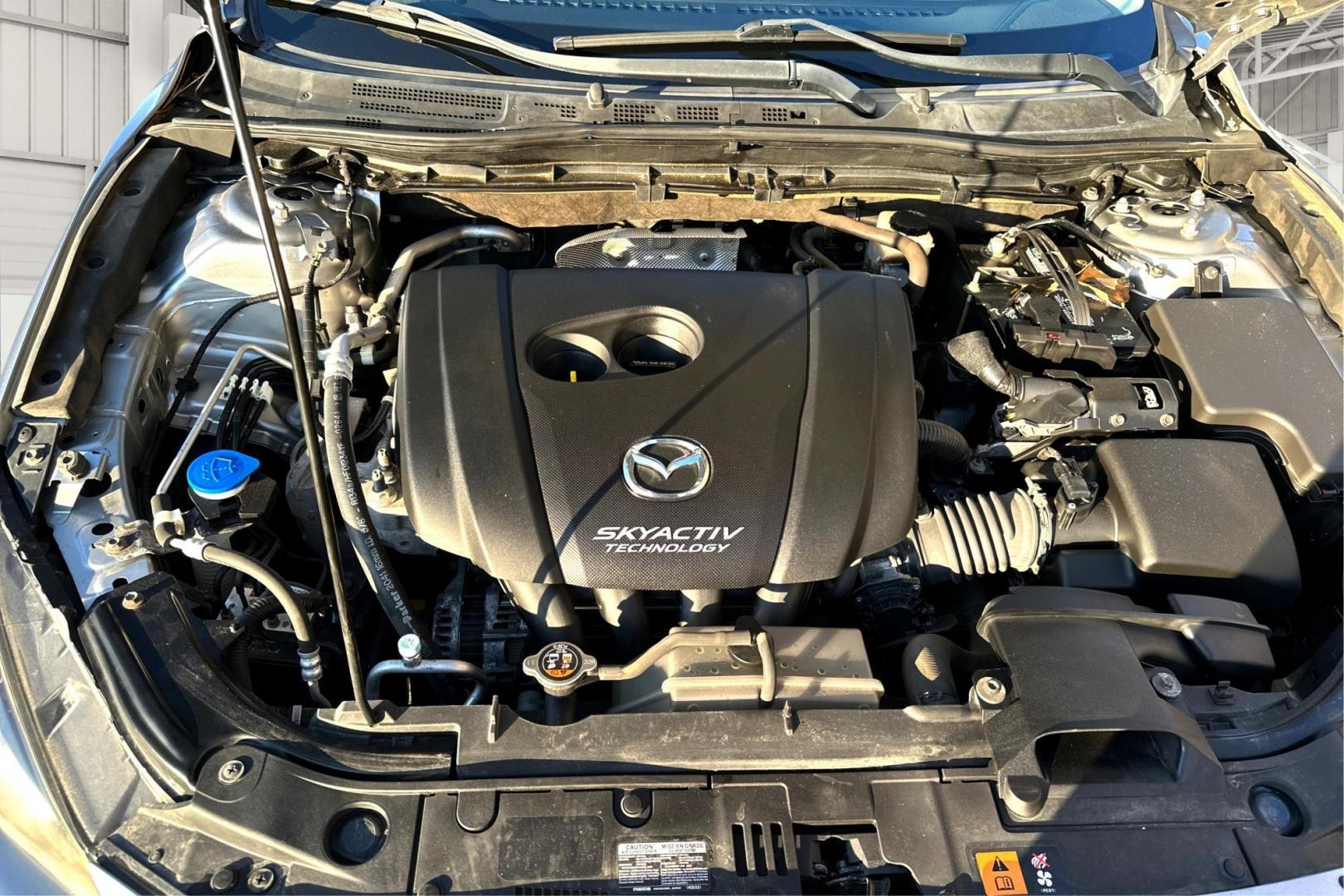 2014 Silver Mazda MAZDA3 i Grand Touring AT 4-Door (JM1BM1W76E1) with an 2.0L L4 DOHC 16V engine, 6-Speed Automatic transmission, located at 344 S Washington Blvd, Ogden, UT, 84404, (801) 399-1799, 41.255482, -111.970848 - Photo#8