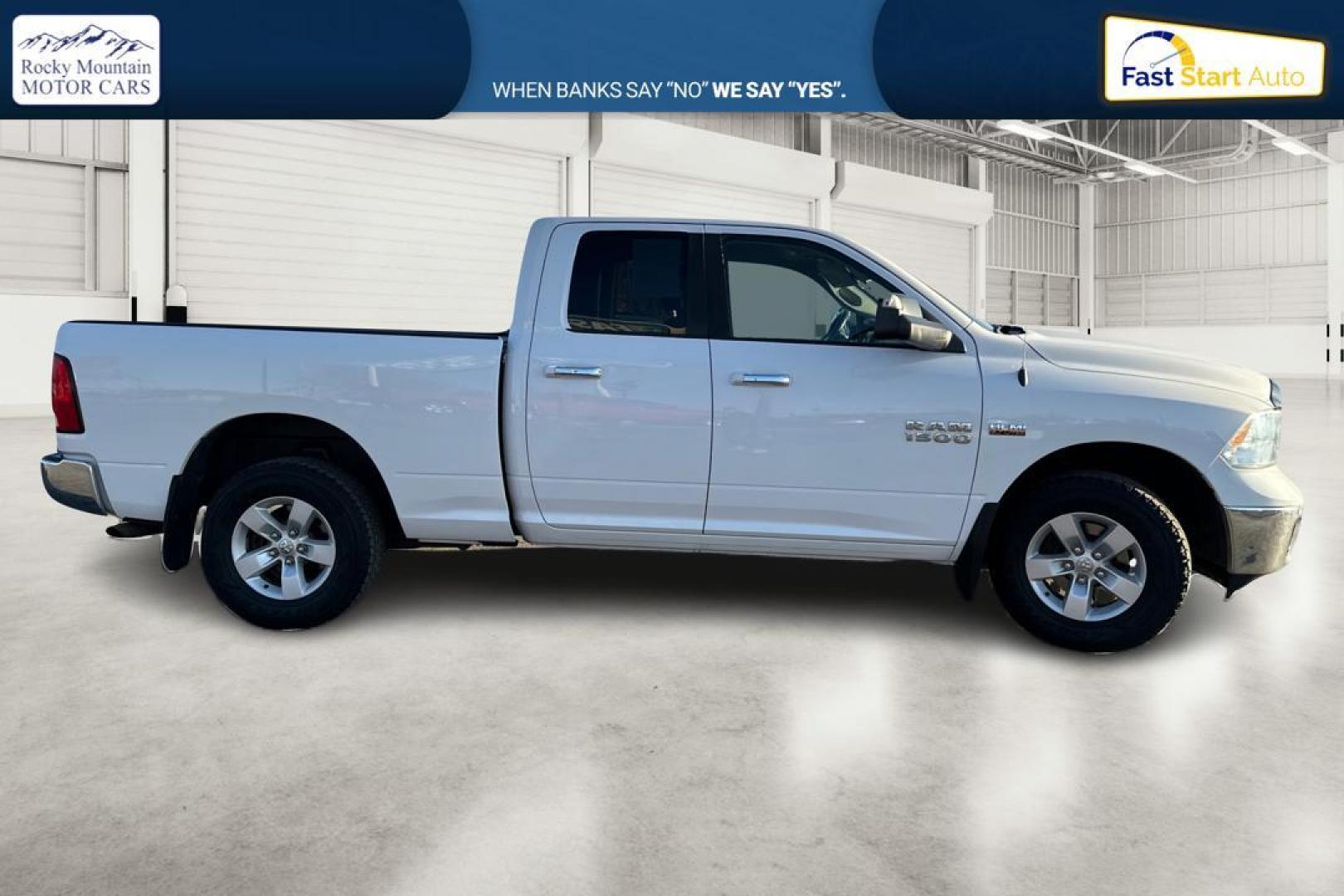 2014 White RAM 1500 SLT Quad Cab 4WD (1C6RR7GT3ES) with an 5.7L V8 OHV 16V engine, 6-Speed Automatic transmission, located at 767 S State Road, Pleasant Grove, UT, 84062, (801) 785-1058, 40.354839, -111.736687 - Photo#1