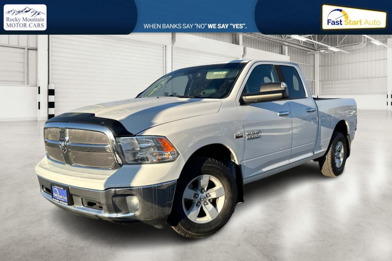 2014 White RAM 1500 SLT Quad Cab 4WD (1C6RR7GT3ES) with an 5.7L V8 OHV 16V engine, 6-Speed Automatic transmission, located at 767 S State Road, Pleasant Grove, UT, 84062, (801) 785-1058, 40.354839, -111.736687 - Photo#8