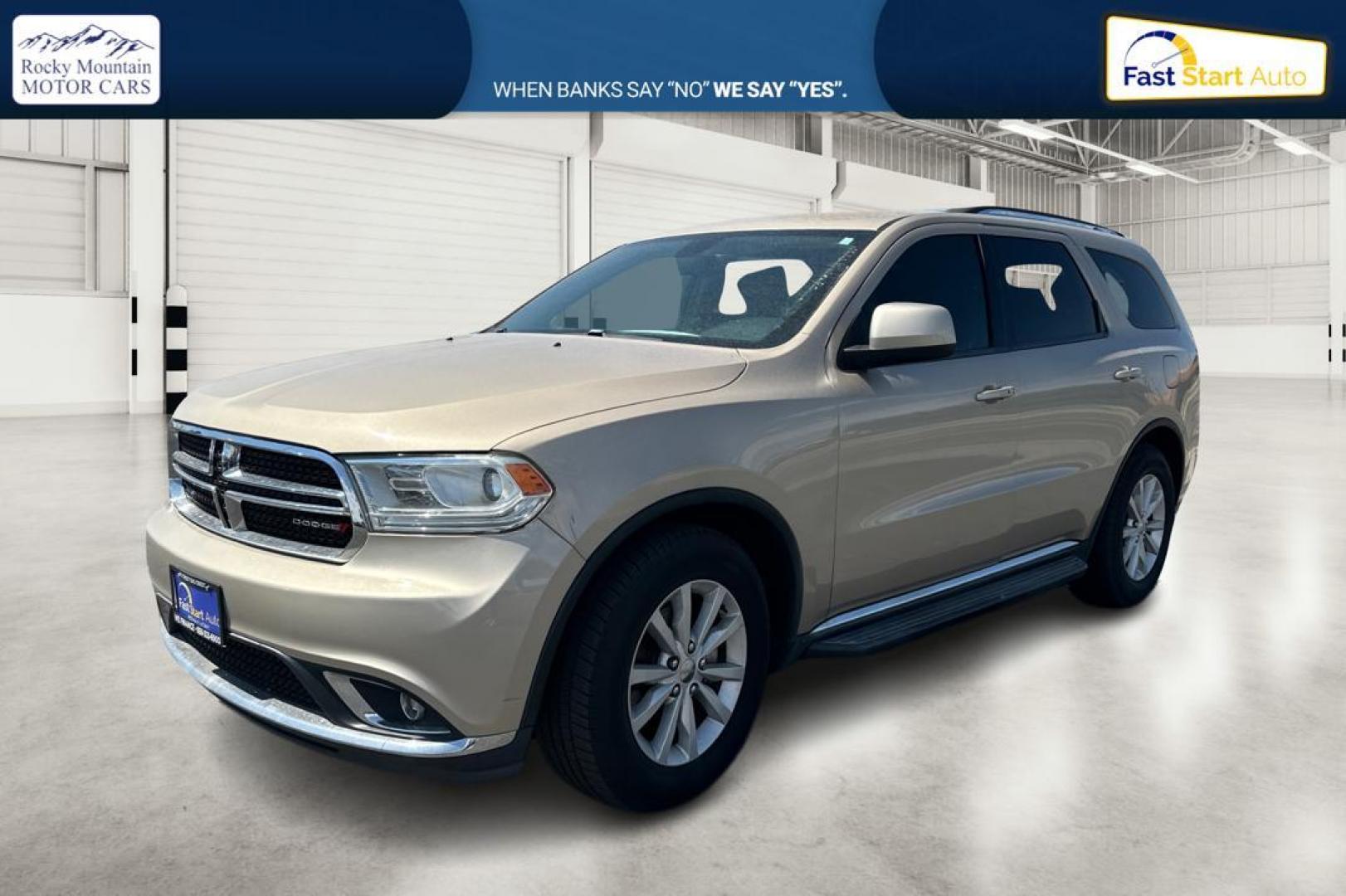 2015 Gold Dodge Durango SXT RWD (1C4RDHAG4FC) with an 3.6L V6 DOHC 24V engine, 8-Speed Automatic transmission, located at 7755 State Street, Midvale, UT, 84047, (801) 753-9063, 40.610329, -111.892159 - Photo#6