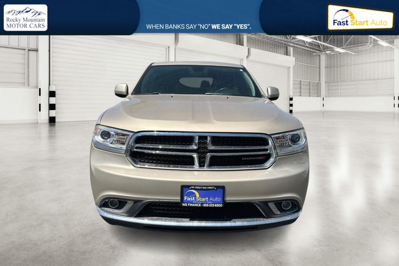 2015 Gold Dodge Durango SXT RWD (1C4RDHAG4FC) with an 3.6L V6 DOHC 24V engine, 8-Speed Automatic transmission, located at 7755 State Street, Midvale, UT, 84047, (801) 753-9063, 40.610329, -111.892159 - Photo#7