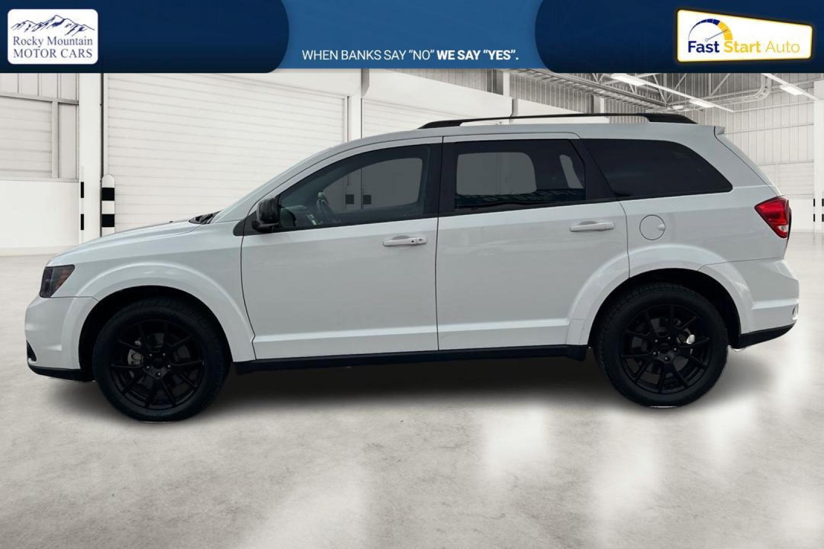 2015 White Dodge Journey SXT (3C4PDCBB8FT) with an 2.4L L6 DOHC 16V engine, 4-Speed Automatic transmission, located at 7755 State Street, Midvale, UT, 84047, (801) 753-9063, 40.610329, -111.892159 - Photo#6