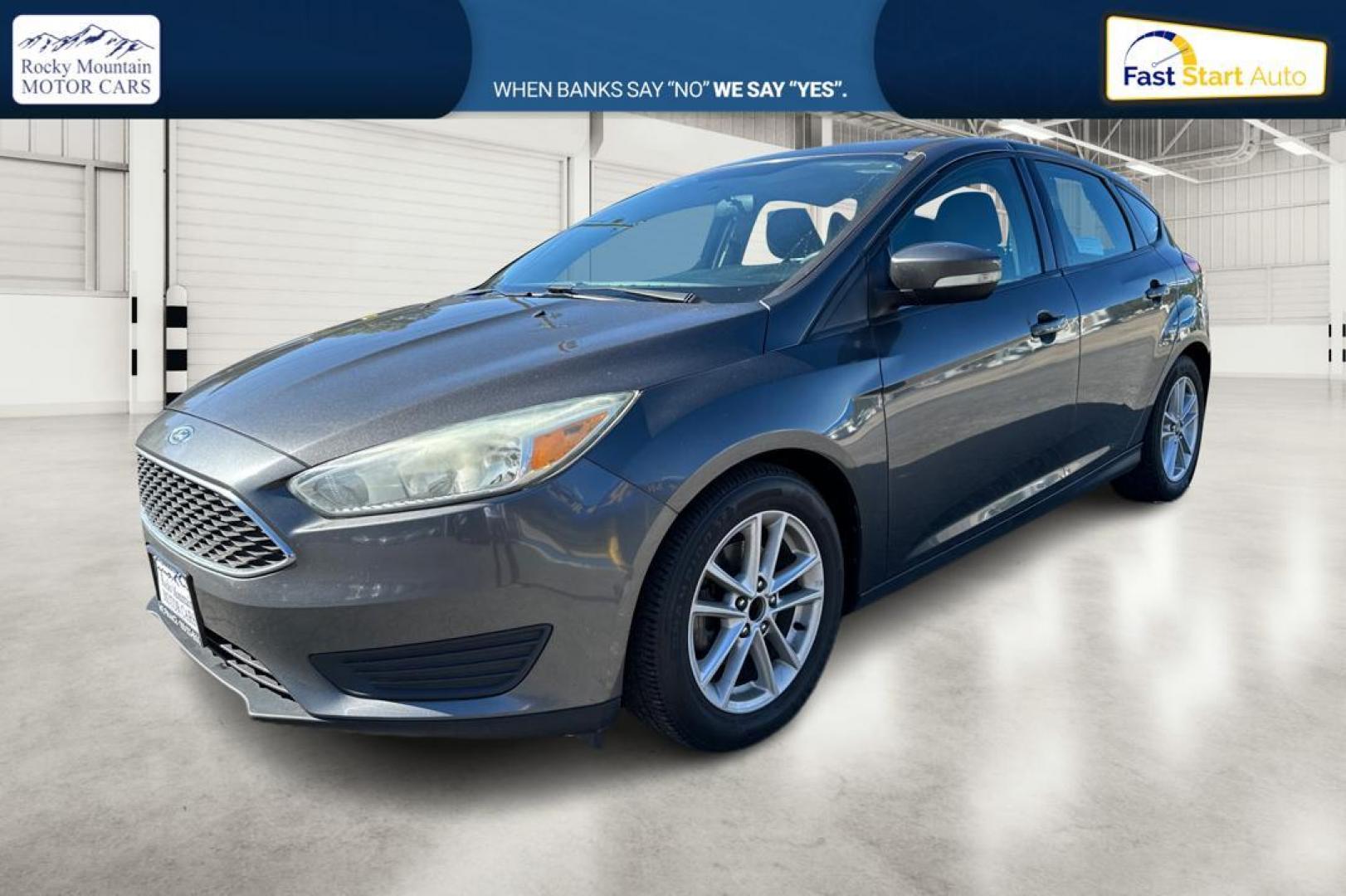 2015 Gray Ford Focus SE Hatch (1FADP3K22FL) with an 2.0L L4 DOHC 16V engine, 5-Speed Manual transmission, located at 344 S Washington Blvd, Ogden, UT, 84404, (801) 399-1799, 41.255482, -111.970848 - Photo#6