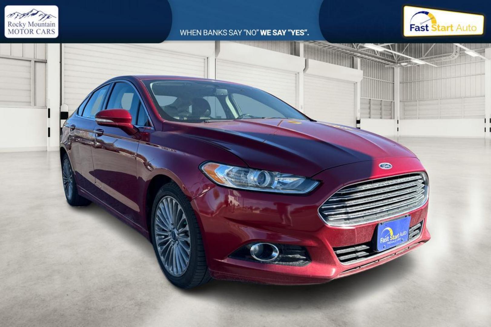 2015 Red Ford Fusion Titanium AWD (3FA6P0D90FR) with an 2.0L L4 DOHC 16V engine, Auto, 6-Spd w/SelShft transmission, located at 7755 State Street, Midvale, UT, 84047, (801) 753-9063, 40.610329, -111.892159 - Photo#0