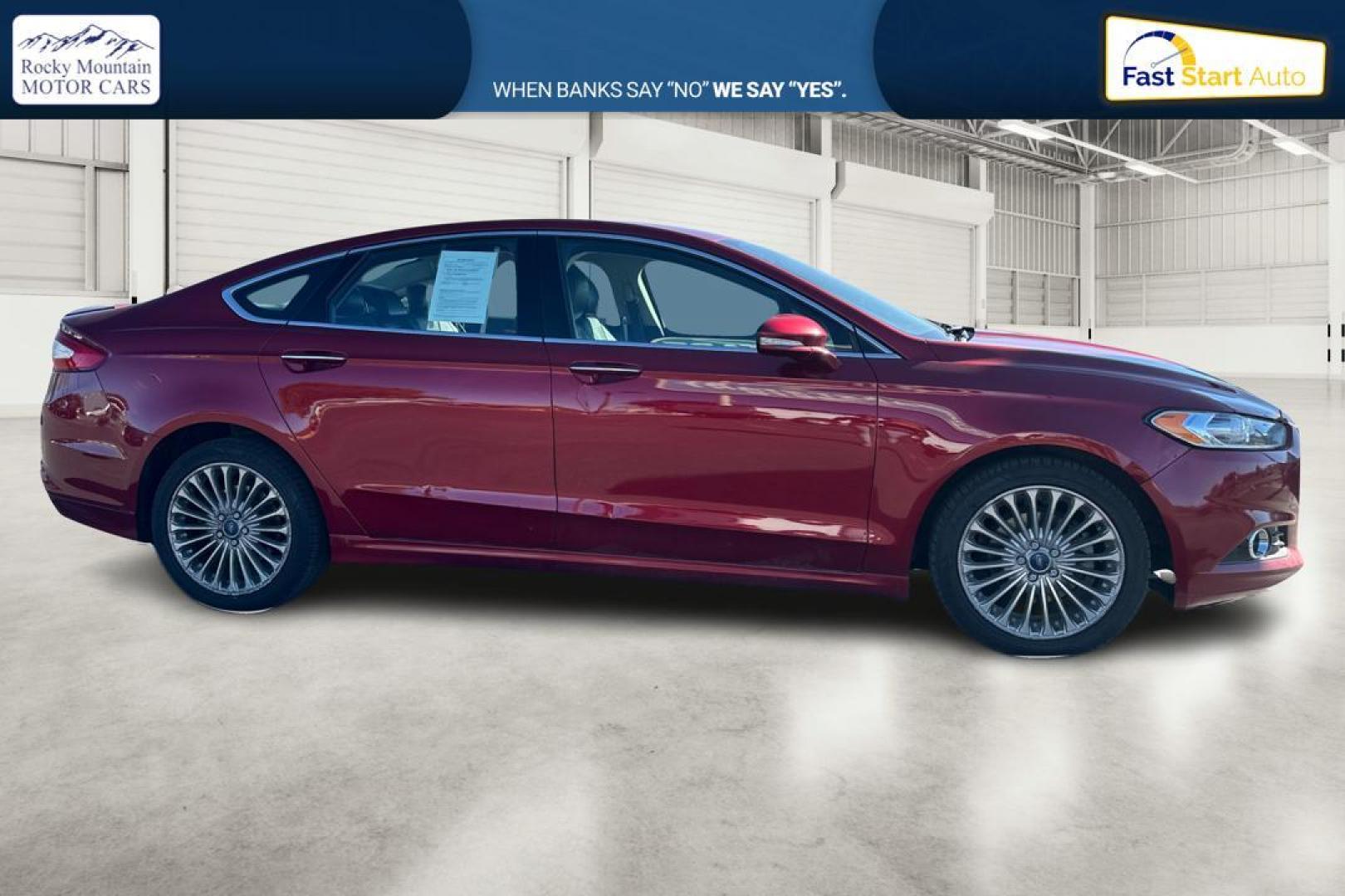 2015 Red Ford Fusion Titanium AWD (3FA6P0D90FR) with an 2.0L L4 DOHC 16V engine, Auto, 6-Spd w/SelShft transmission, located at 7755 State Street, Midvale, UT, 84047, (801) 753-9063, 40.610329, -111.892159 - Photo#1