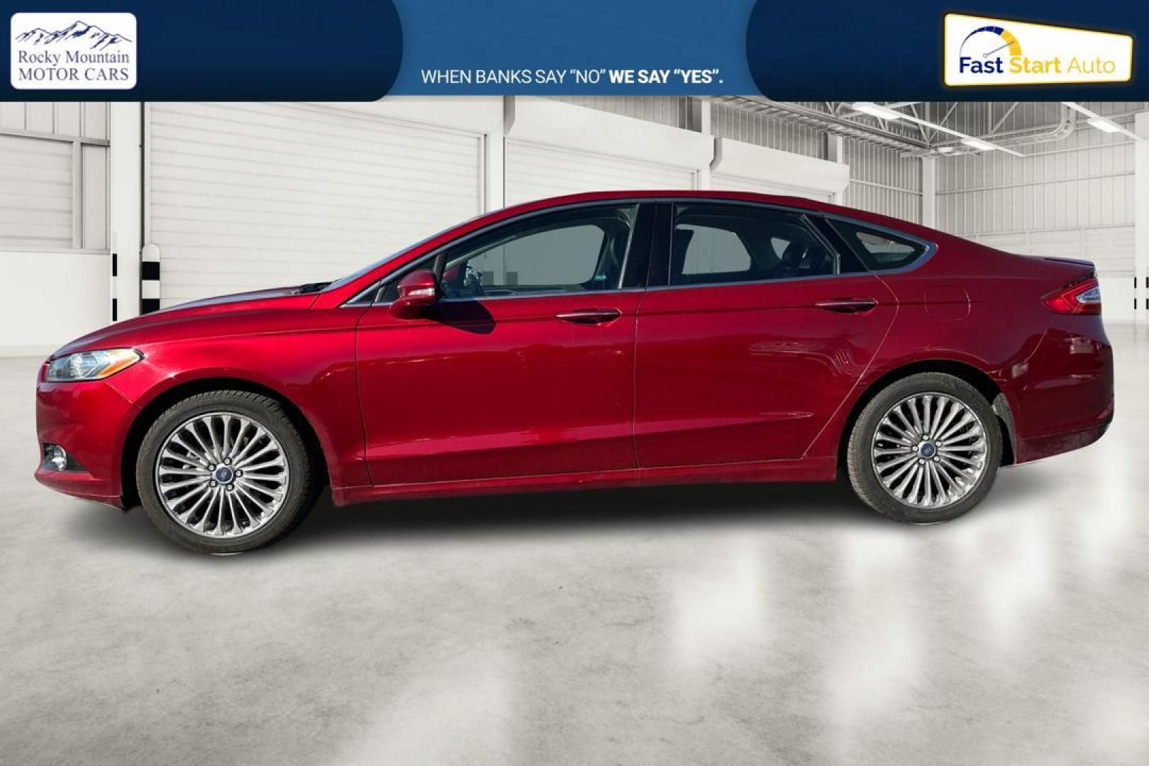 2015 Red Ford Fusion Titanium AWD (3FA6P0D90FR) with an 2.0L L4 DOHC 16V engine, Auto, 6-Spd w/SelShft transmission, located at 7755 State Street, Midvale, UT, 84047, (801) 753-9063, 40.610329, -111.892159 - Photo#6