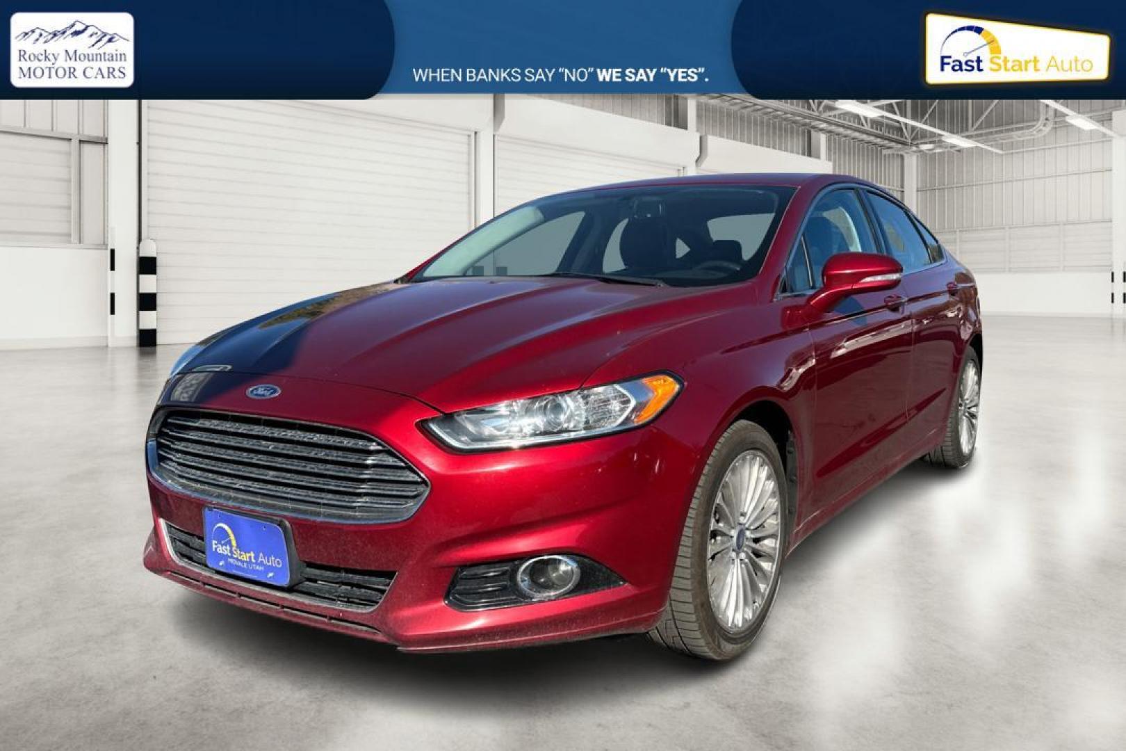 2015 Red Ford Fusion Titanium AWD (3FA6P0D90FR) with an 2.0L L4 DOHC 16V engine, Auto, 6-Spd w/SelShft transmission, located at 7755 State Street, Midvale, UT, 84047, (801) 753-9063, 40.610329, -111.892159 - Photo#8