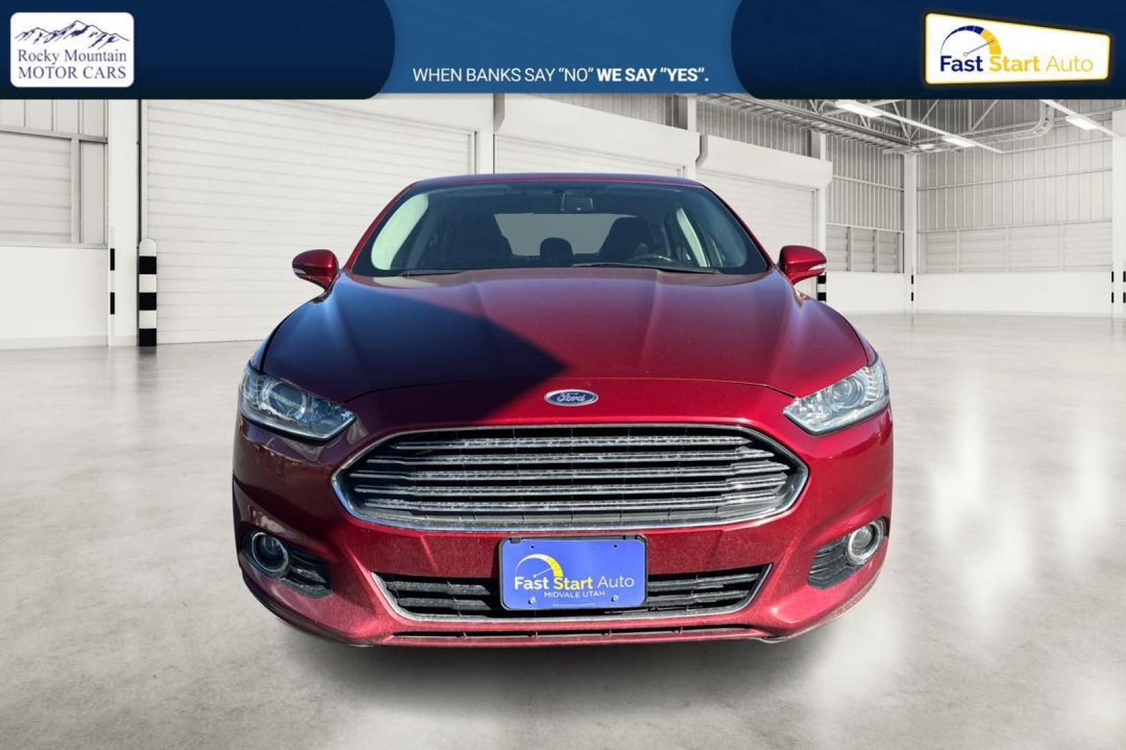 2015 Red Ford Fusion Titanium AWD (3FA6P0D90FR) with an 2.0L L4 DOHC 16V engine, Auto, 6-Spd w/SelShft transmission, located at 7755 State Street, Midvale, UT, 84047, (801) 753-9063, 40.610329, -111.892159 - Photo#9