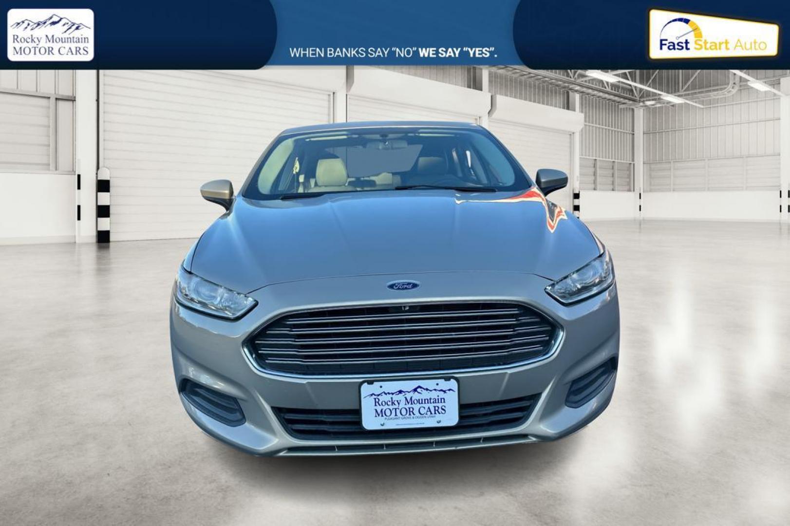 2015 Gray Ford Fusion S (3FA6P0G77FR) with an 2.5L L4 DOHC 16V engine, Auto, 6-Spd w/SelShft transmission, located at 344 S Washington Blvd, Ogden, UT, 84404, (801) 399-1799, 41.255482, -111.970848 - Photo#9