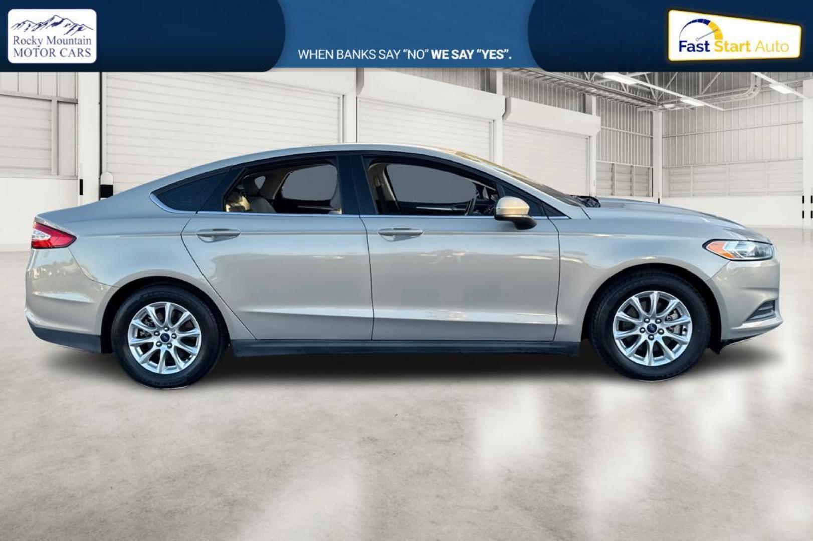 2015 Gray Ford Fusion S (3FA6P0G77FR) with an 2.5L L4 DOHC 16V engine, Auto, 6-Spd w/SelShft transmission, located at 344 S Washington Blvd, Ogden, UT, 84404, (801) 399-1799, 41.255482, -111.970848 - Photo#1