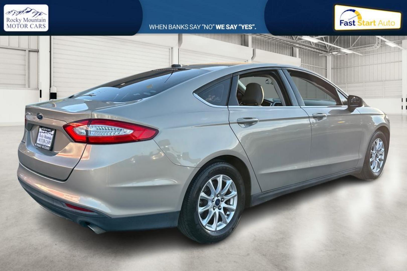 2015 Gray Ford Fusion S (3FA6P0G77FR) with an 2.5L L4 DOHC 16V engine, Auto, 6-Spd w/SelShft transmission, located at 344 S Washington Blvd, Ogden, UT, 84404, (801) 399-1799, 41.255482, -111.970848 - Photo#2