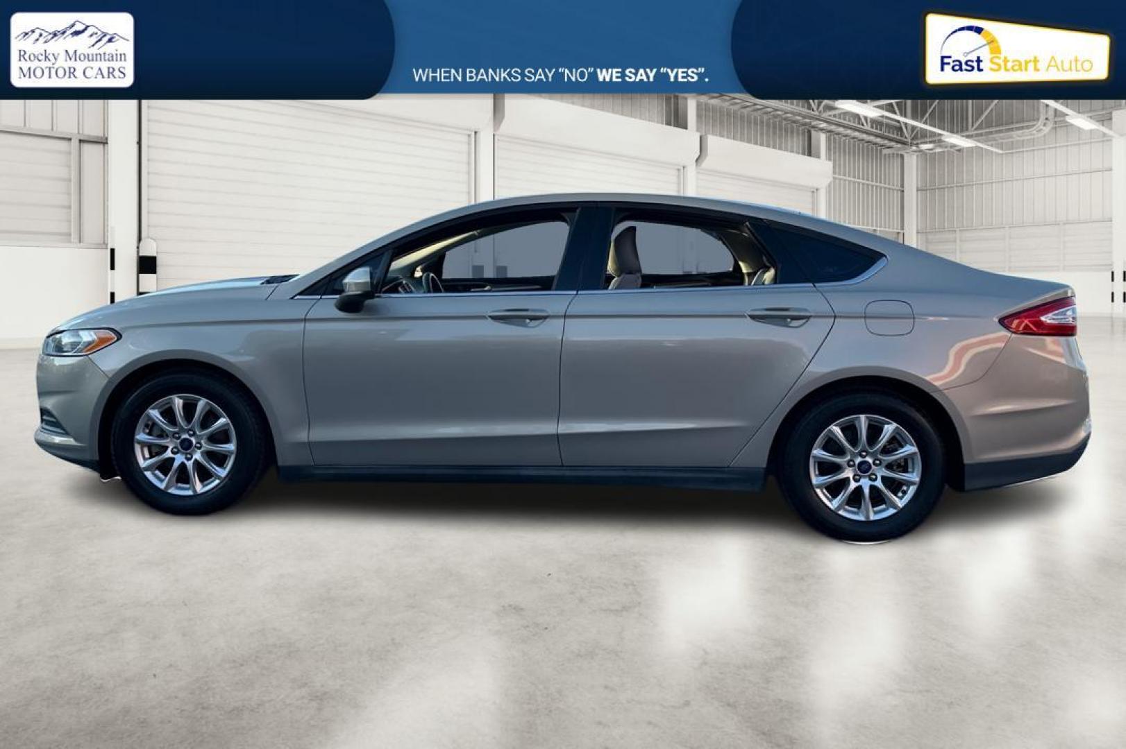 2015 Gray Ford Fusion S (3FA6P0G77FR) with an 2.5L L4 DOHC 16V engine, Auto, 6-Spd w/SelShft transmission, located at 344 S Washington Blvd, Ogden, UT, 84404, (801) 399-1799, 41.255482, -111.970848 - Photo#6