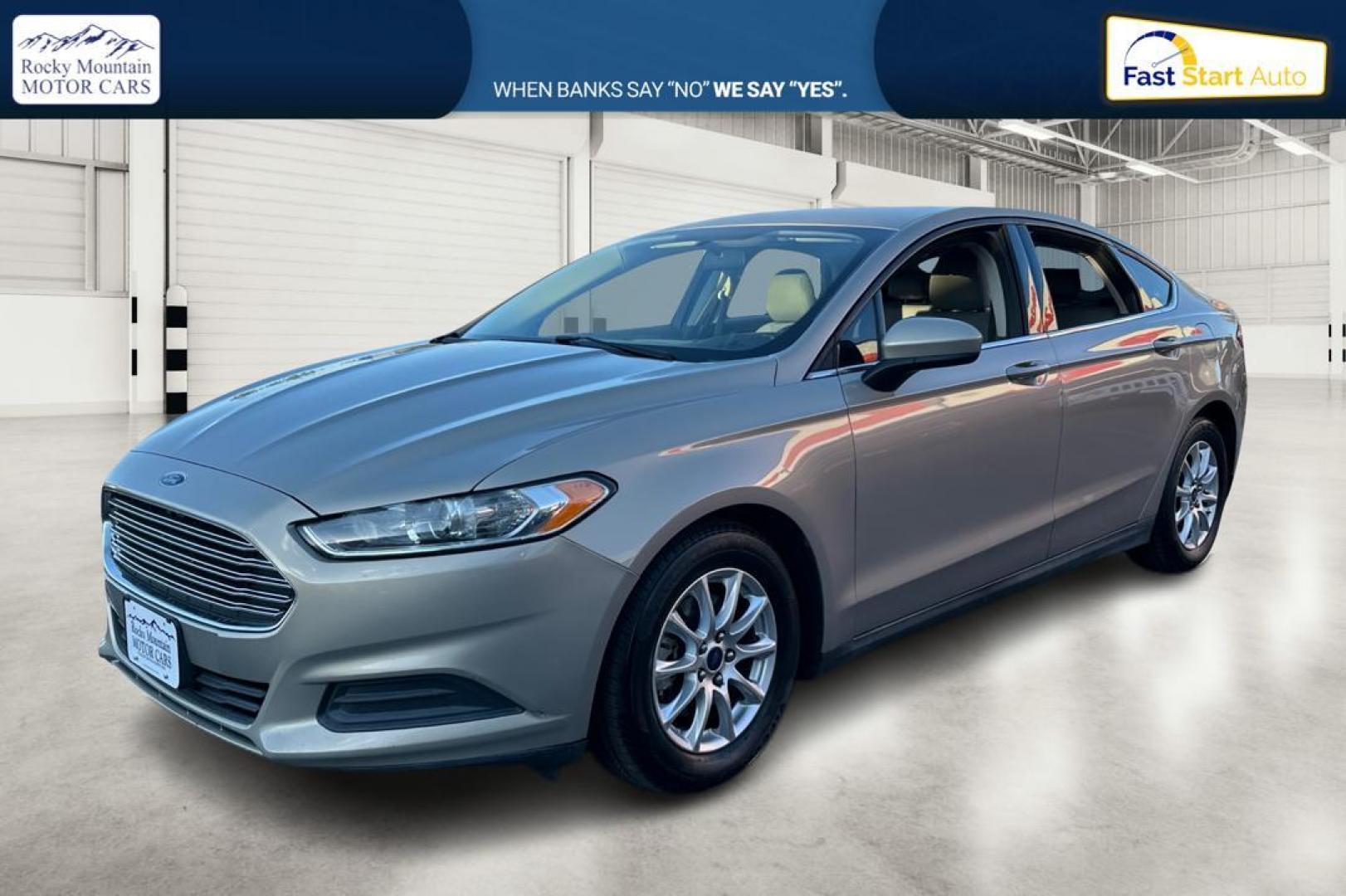 2015 Gray Ford Fusion S (3FA6P0G77FR) with an 2.5L L4 DOHC 16V engine, Auto, 6-Spd w/SelShft transmission, located at 344 S Washington Blvd, Ogden, UT, 84404, (801) 399-1799, 41.255482, -111.970848 - Photo#8