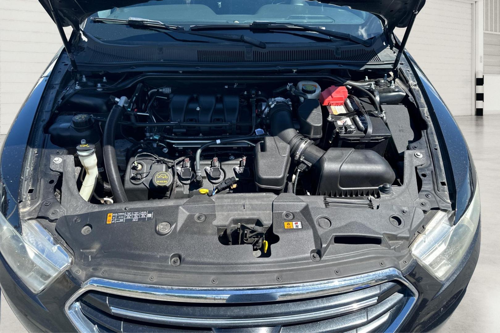 2015 Black Ford Taurus Limited FWD (1FAHP2F89FG) with an 3.5L V6 DOHC 24V engine, 6-Speed Automatic transmission, located at 344 S Washington Blvd, Ogden, UT, 84404, (801) 399-1799, 41.255482, -111.970848 - Photo#8