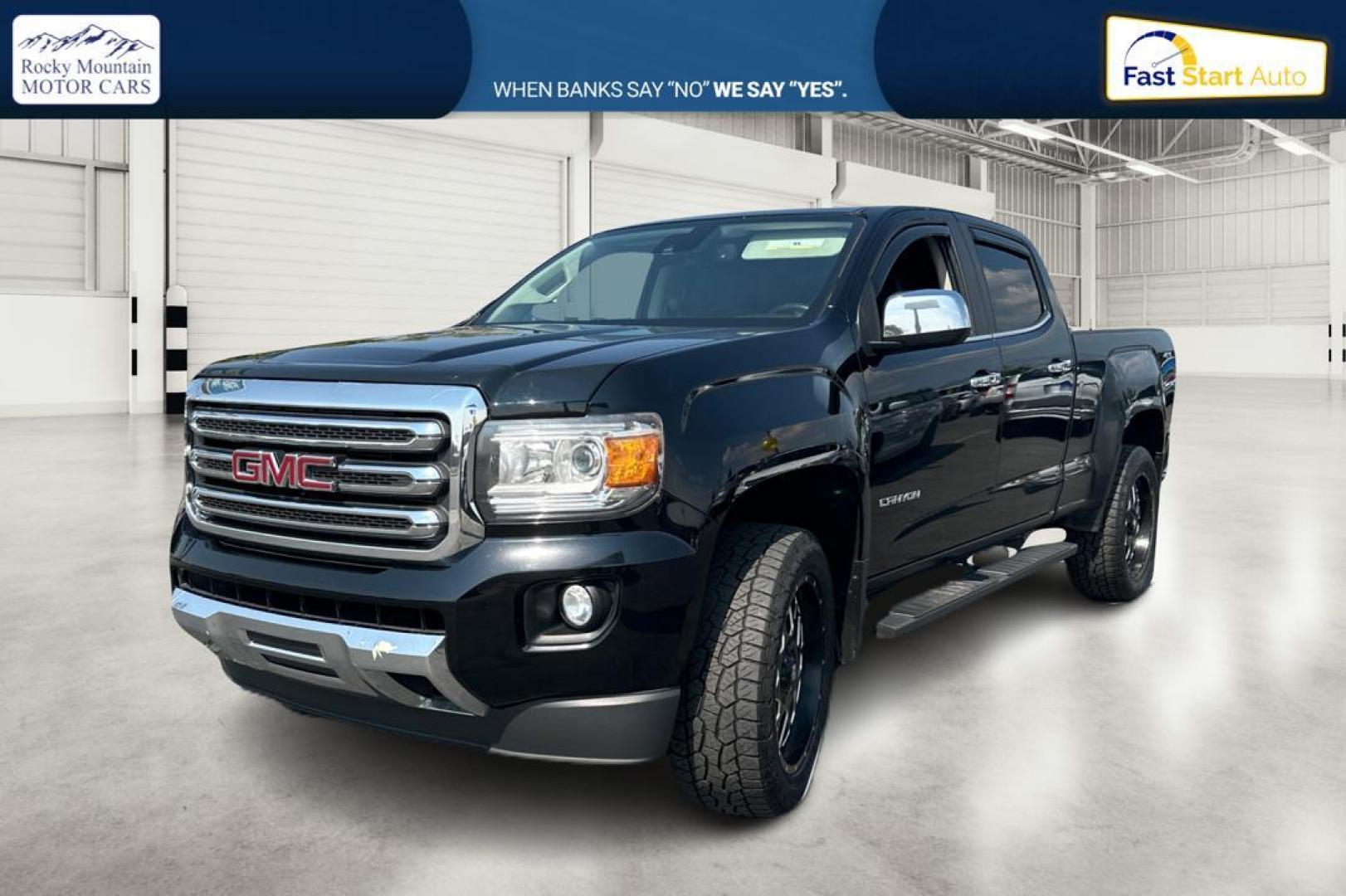 2015 Black GMC Canyon SLT Crew Cab 4WD Short Box (1GTG6CE36F1) with an 3.6L V6 DOHC 24V engine, 6-Speed Automatic transmission, located at 344 S Washington Blvd, Ogden, UT, 84404, (801) 399-1799, 41.255482, -111.970848 - Photo#6