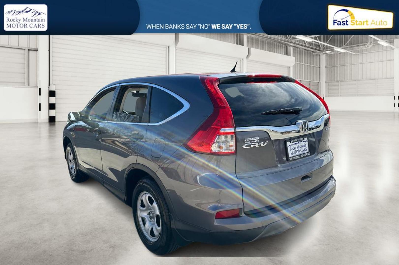 2015 Gray Honda CR-V LX 4WD (5J6RM4H30FL) with an 2.4L L4 DOHC 16V engine, Continuously Variable Transmission transmission, located at 7755 State Street, Midvale, UT, 84047, (801) 753-9063, 40.610329, -111.892159 - Photo#4